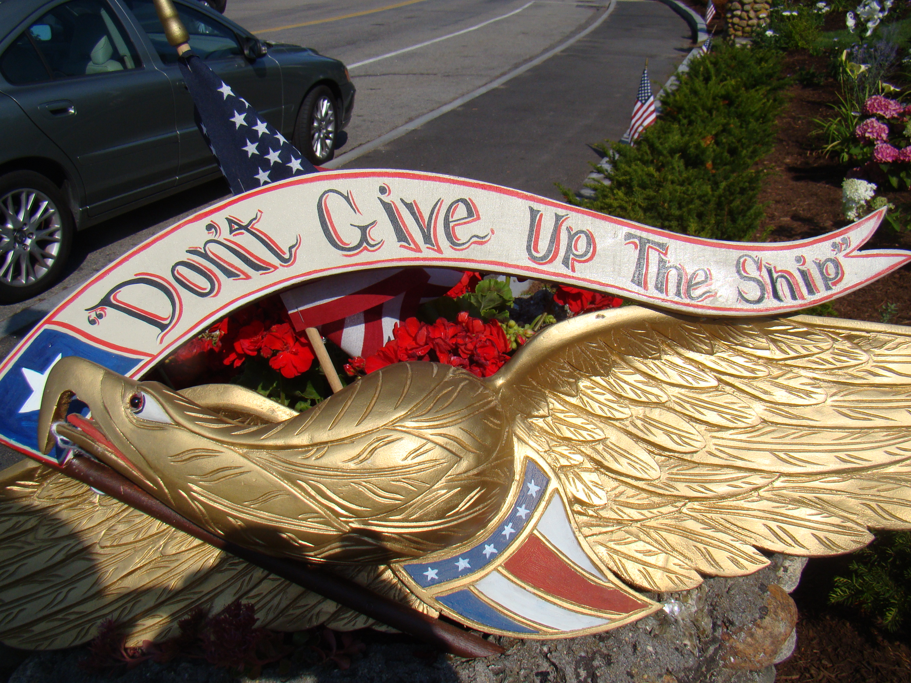 A finely carved "Bellamy" style eagle plaque with banner "Don't Give Up the Ship"