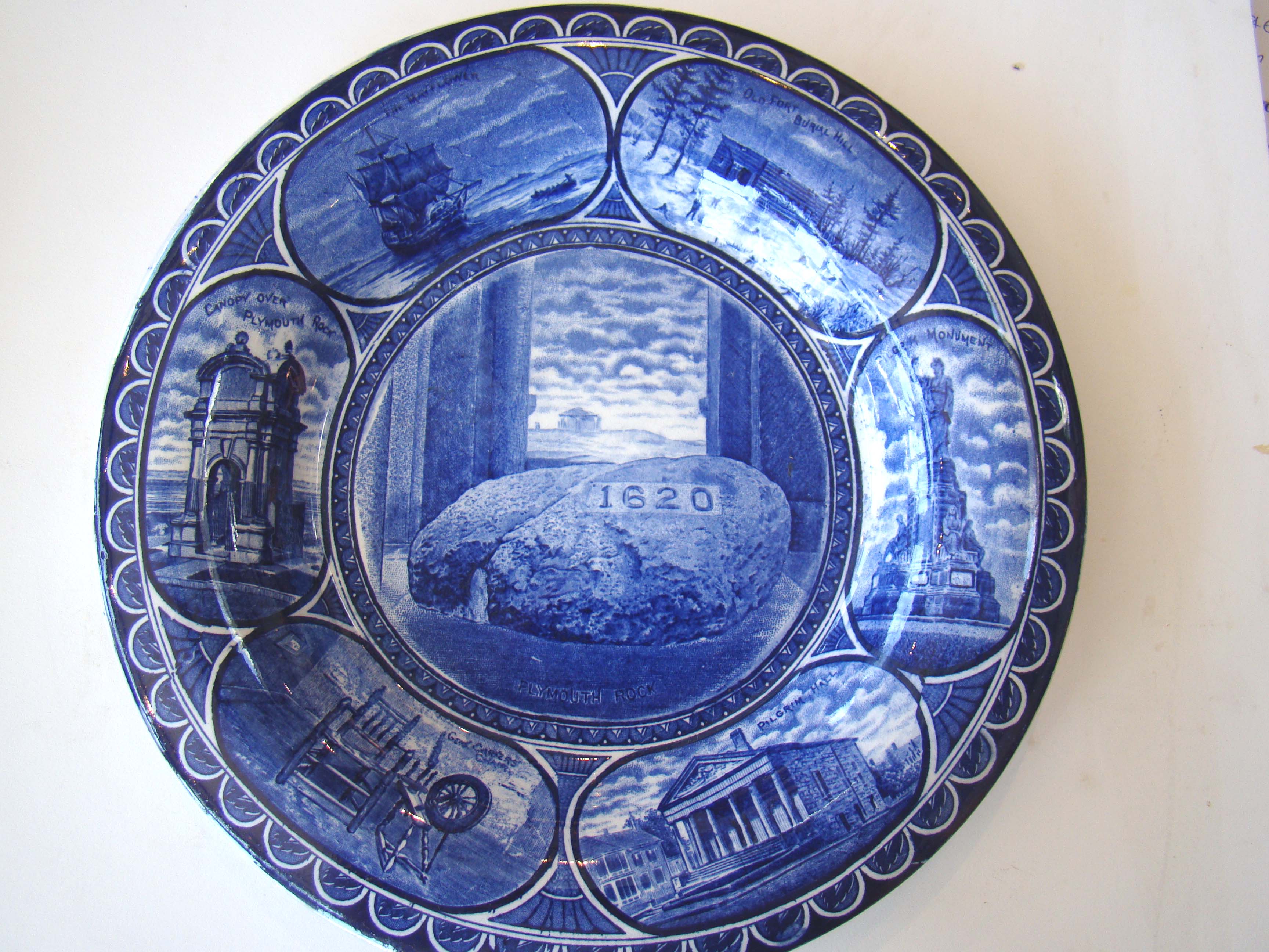 A fine commemorative plate featuring historic scenes of PLYMOUTH, MA., including Plymouth Rock. Made in 1906