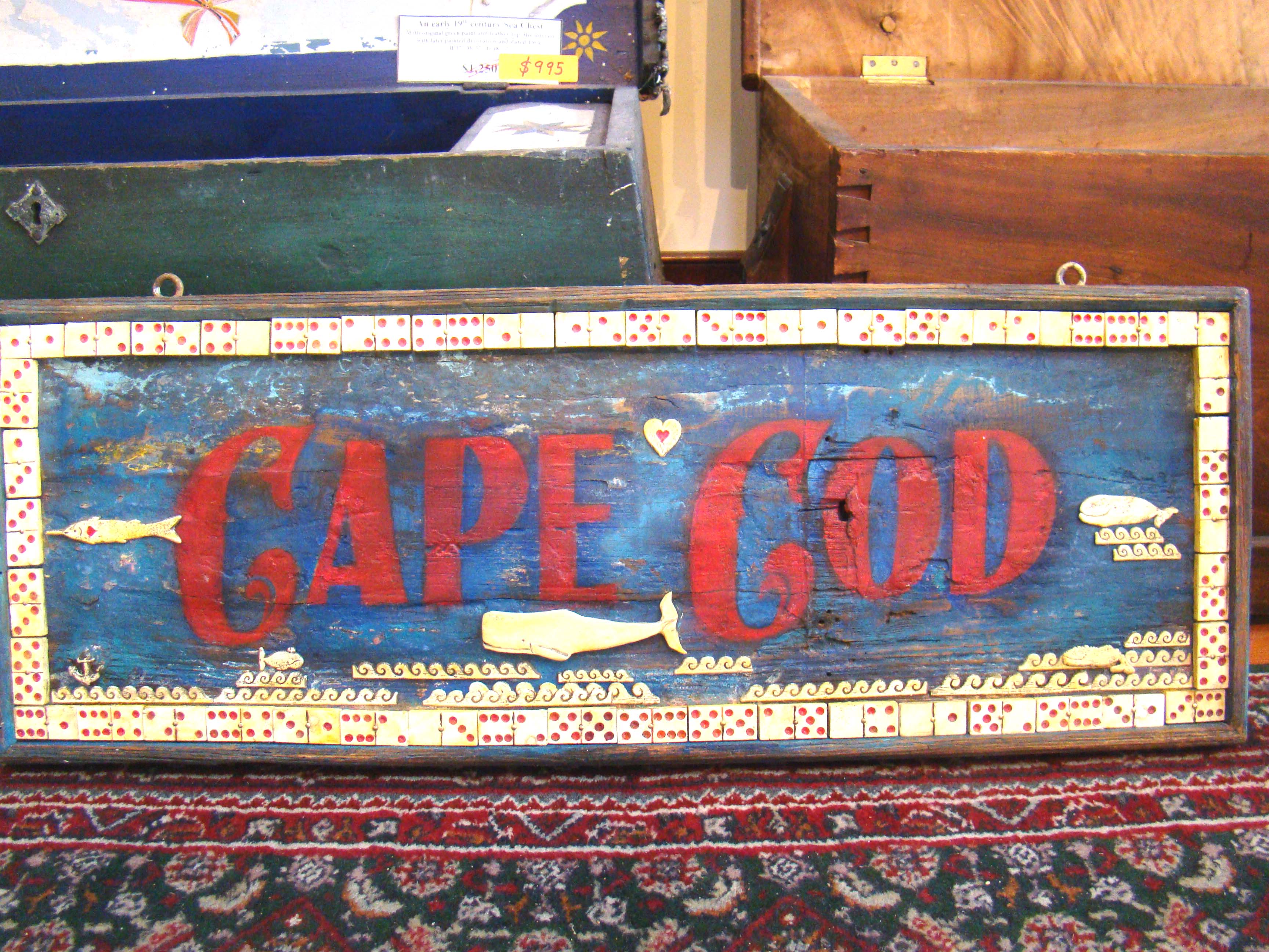 A FANTASTIC carved and inlaid CAPE COD sign made by world renown folk artist and sculptor Erik Erikson