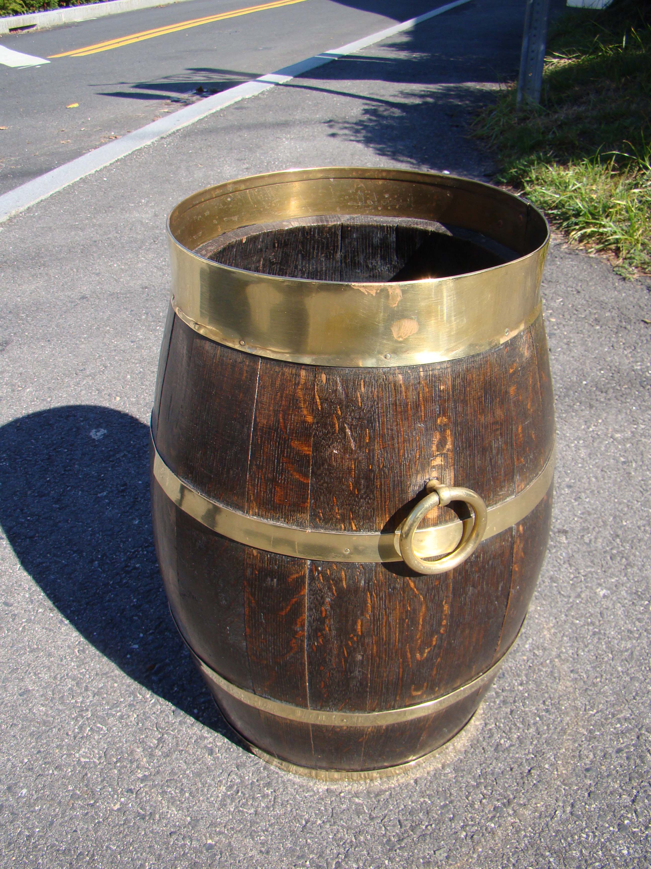 An English brass bound oak barrel circa 1840-1860
