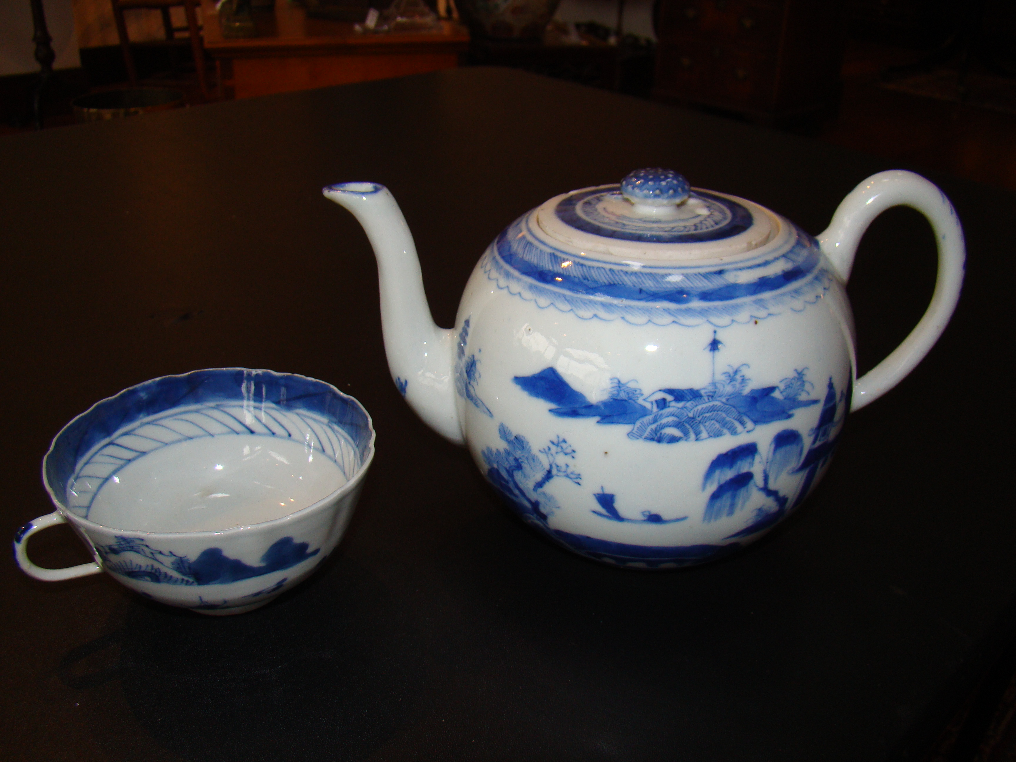 A Chinese Export Teapot and cup in the Canton pattern circa 1840