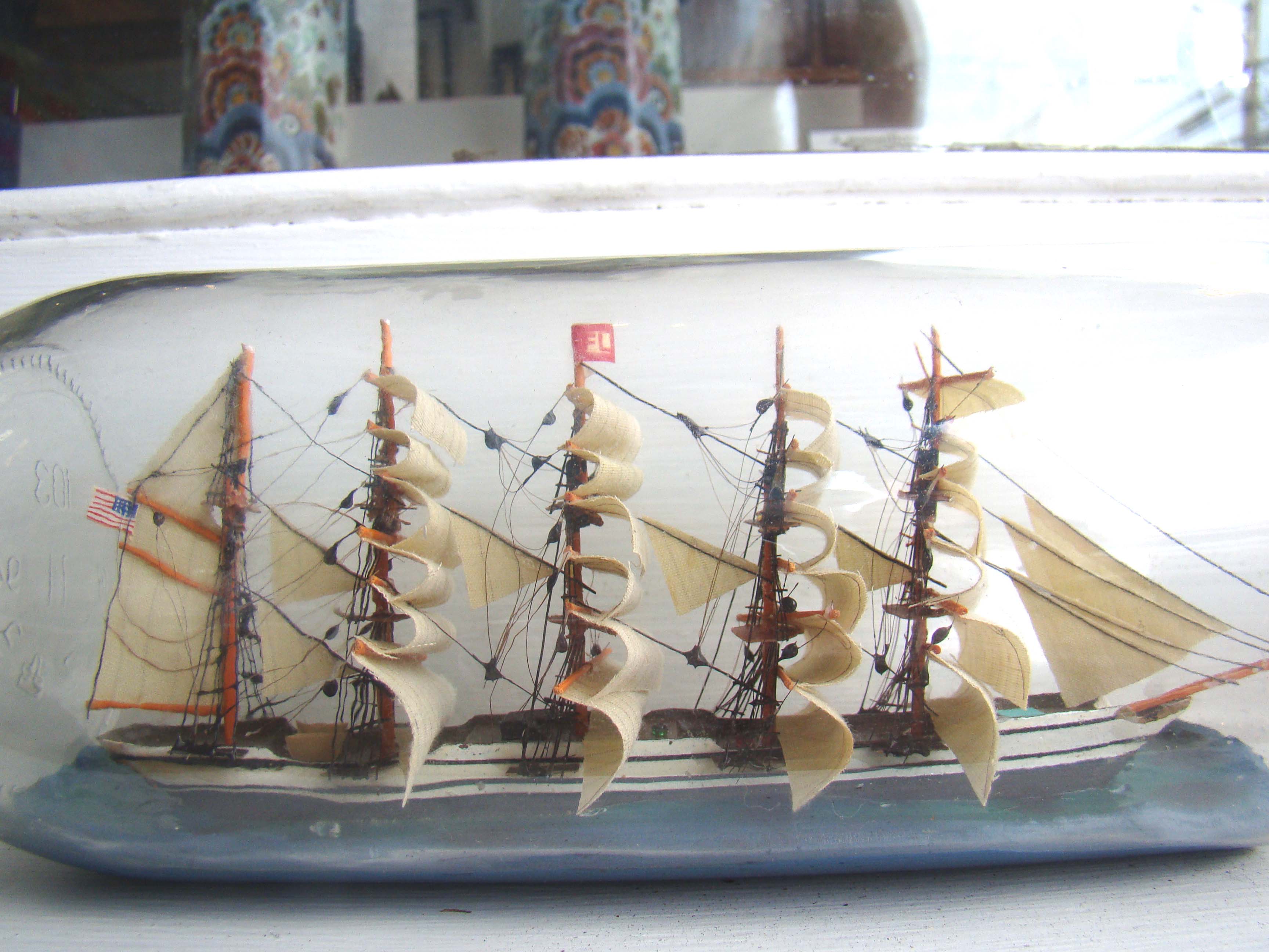 A fine vintage five masted ship in a bottle