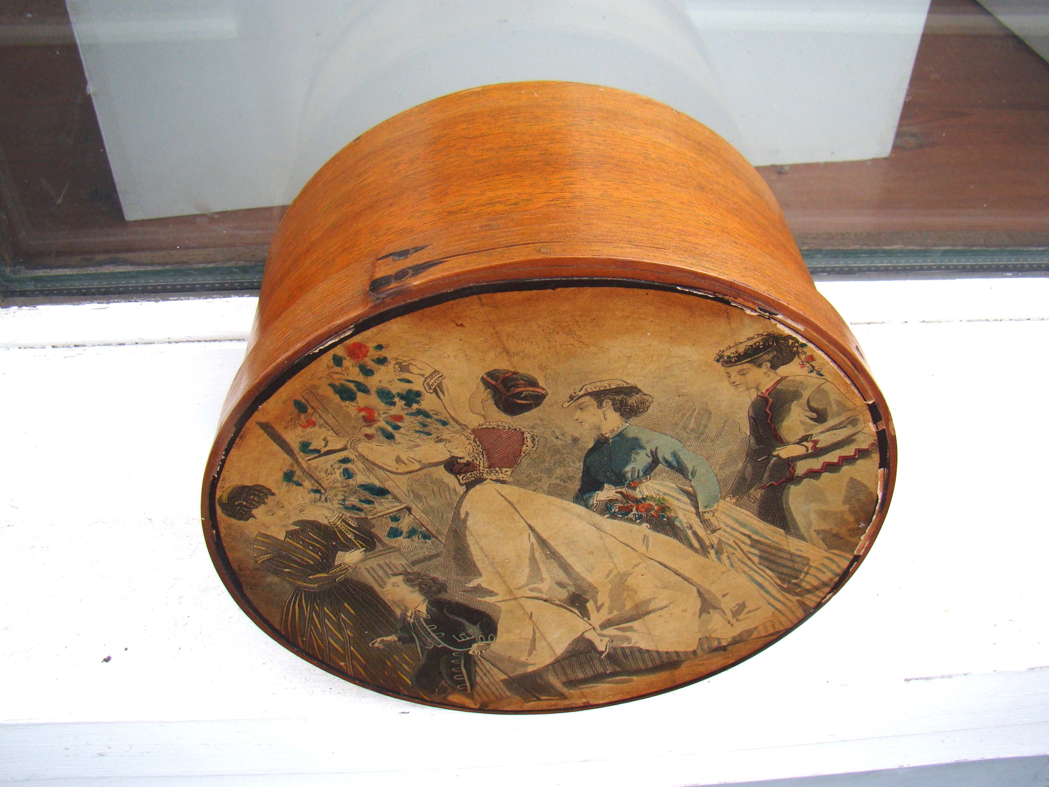 A 19th century sewing box with painted lid and original interior circa 1880-1890