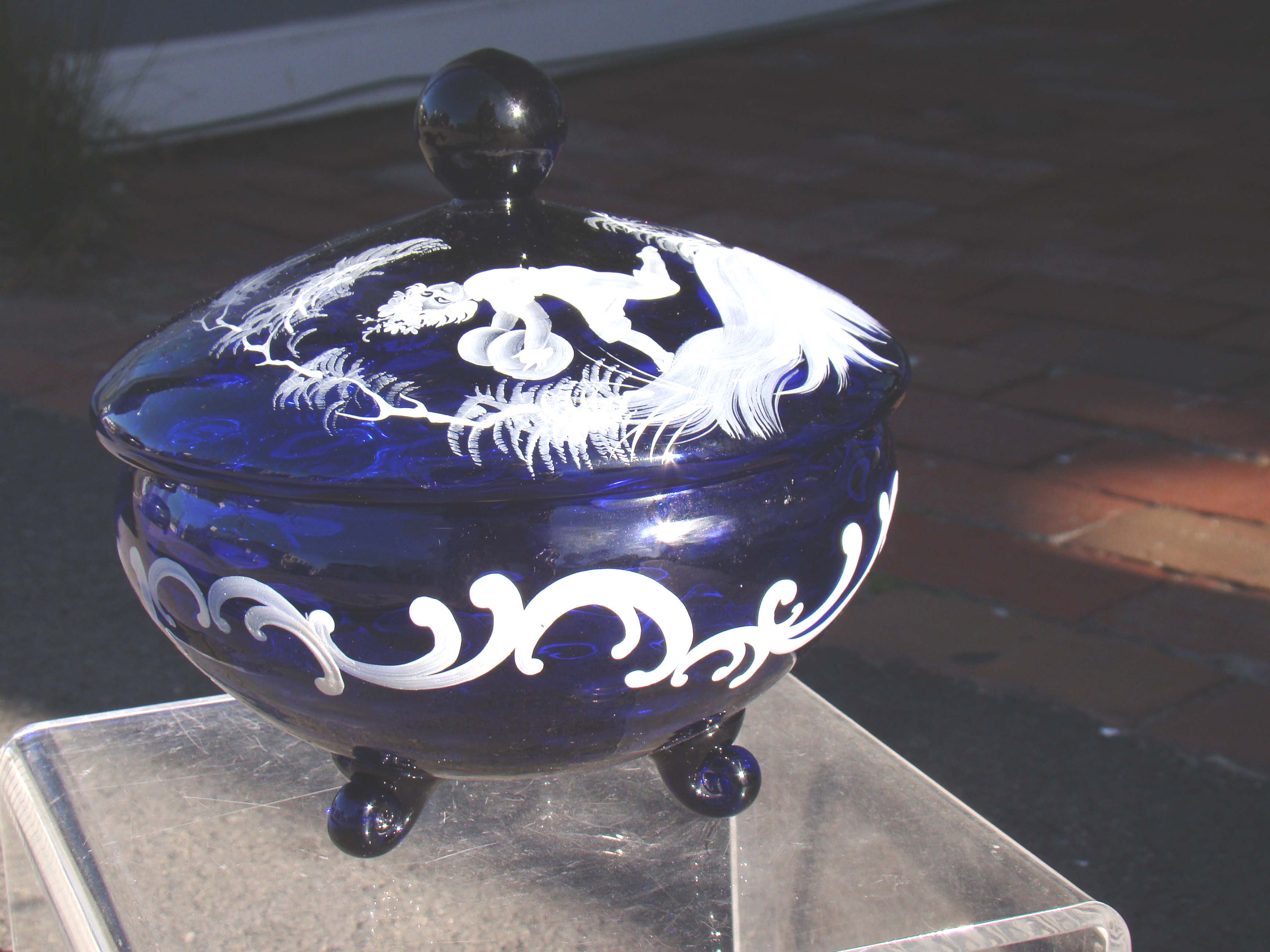A beautiful Mary Gregory (1859-1909) cobalt blue covered jar with two dancing children on the lid