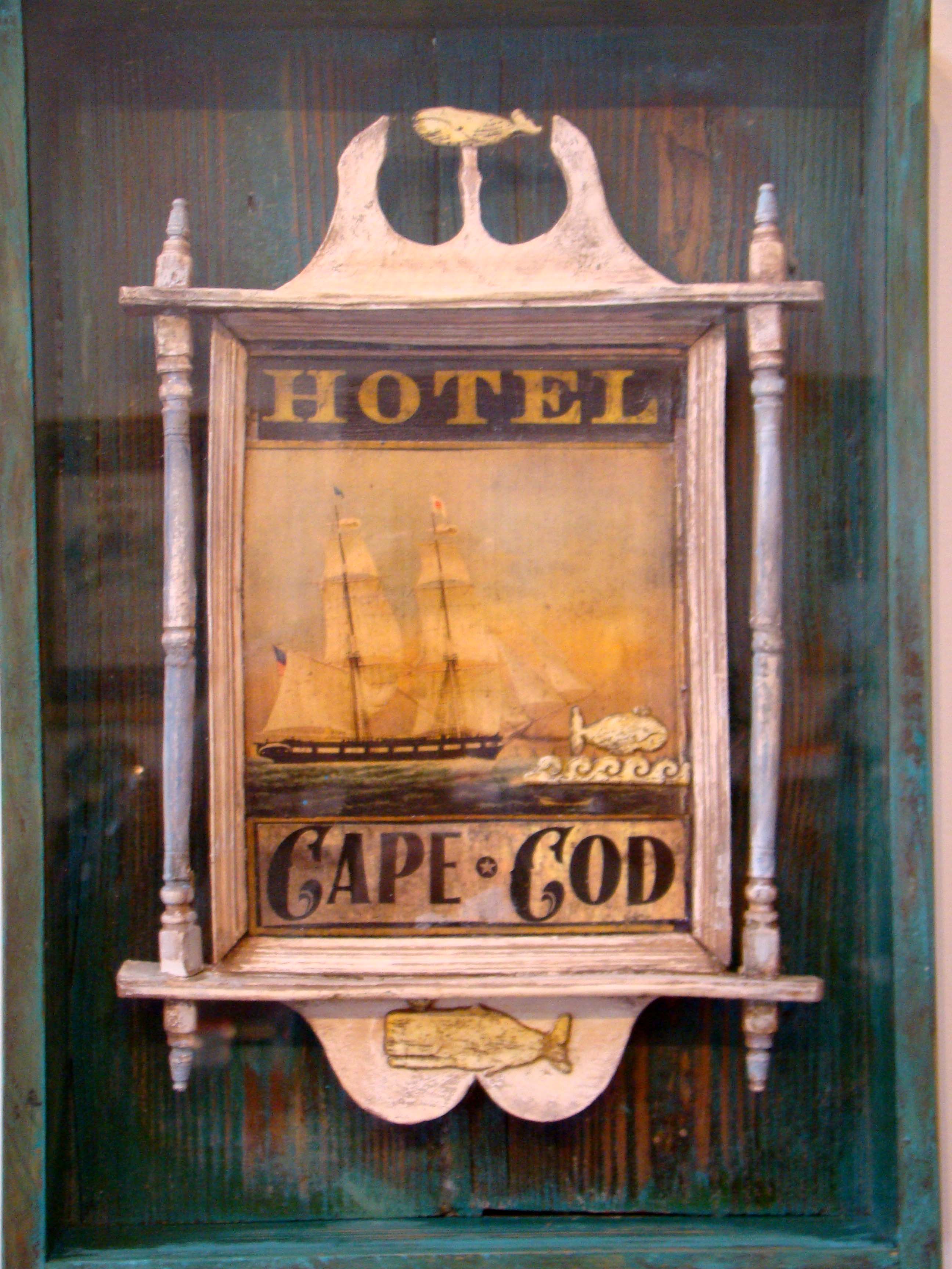 An absolutely charming and unique contemporary work of art depicting a hanging sign for HOTEL CAPE COD made by world renown artist Erik Erikson