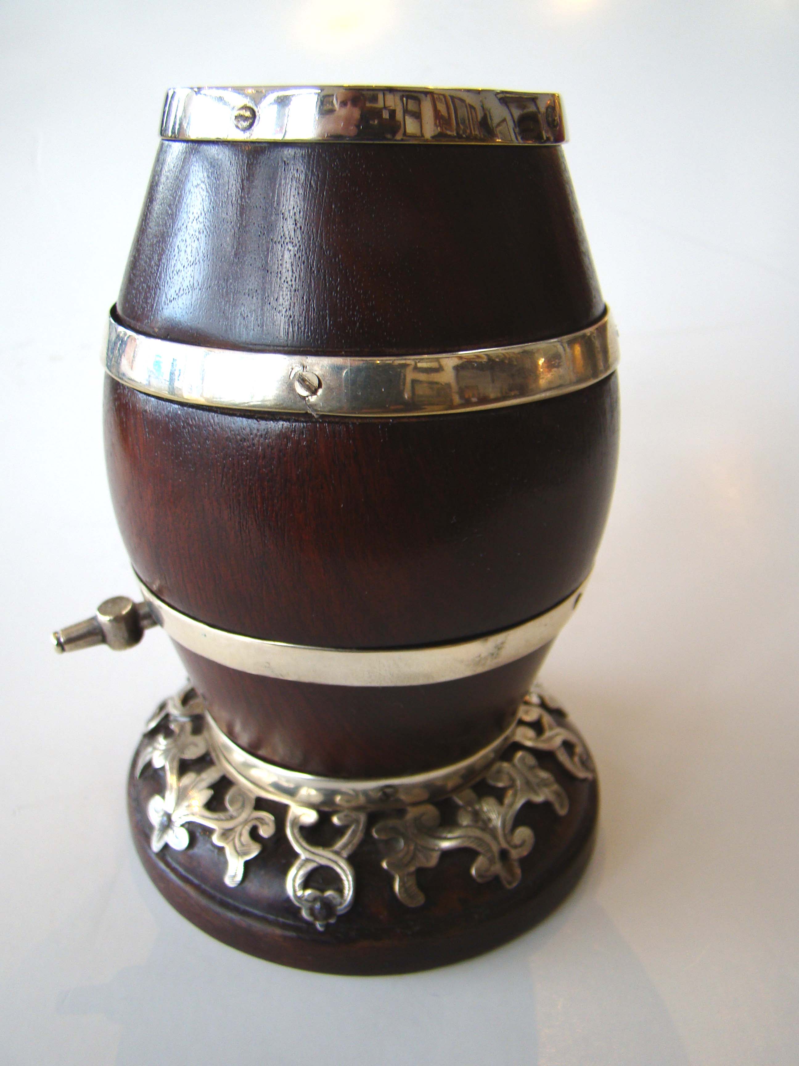 A fine 19th century English silver mounted lignum vitae string barrel circa 1870