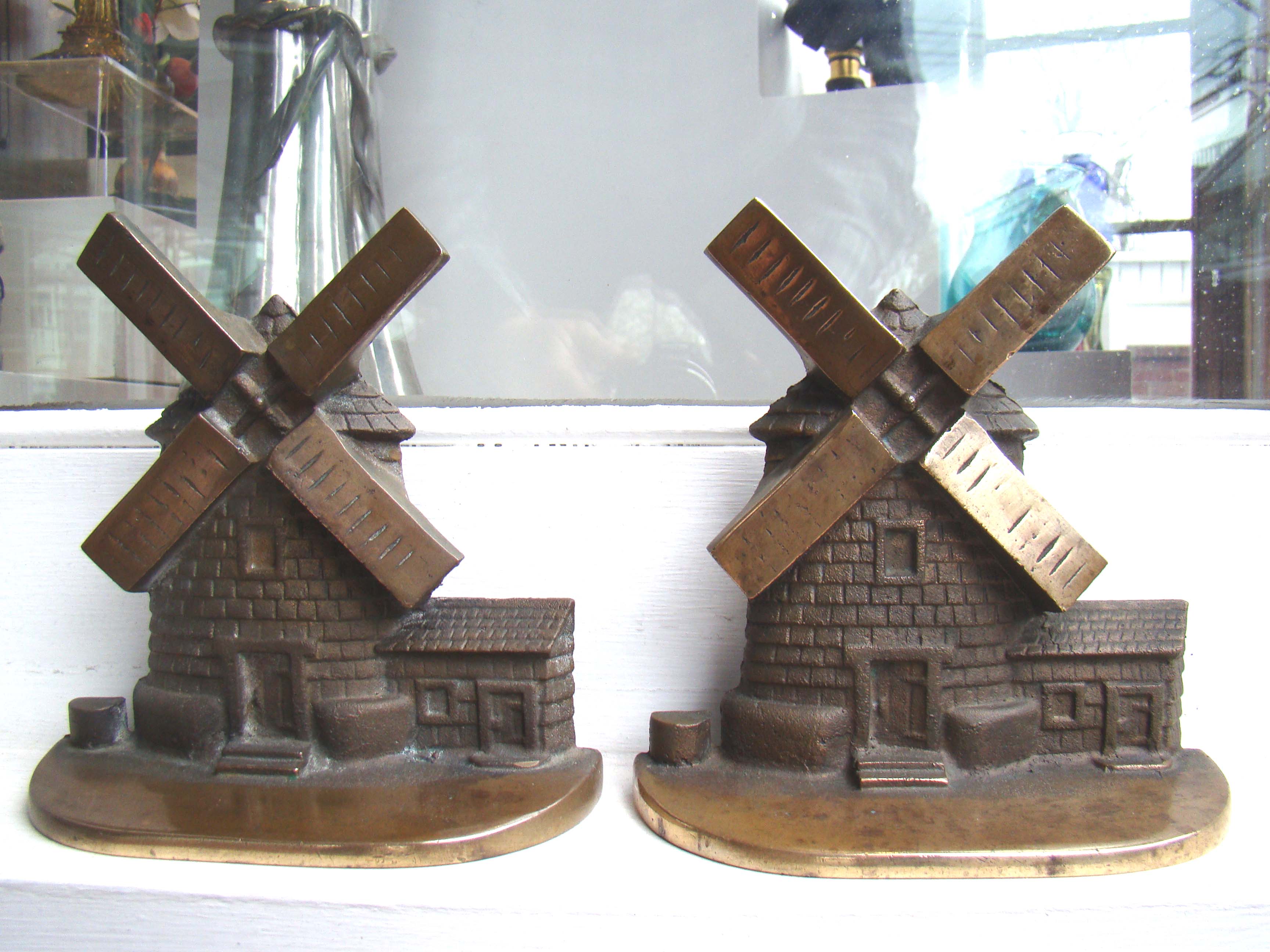 A fine pair of solid bronze "OLD CAPE COD WINDMILL" bookends circa 1920