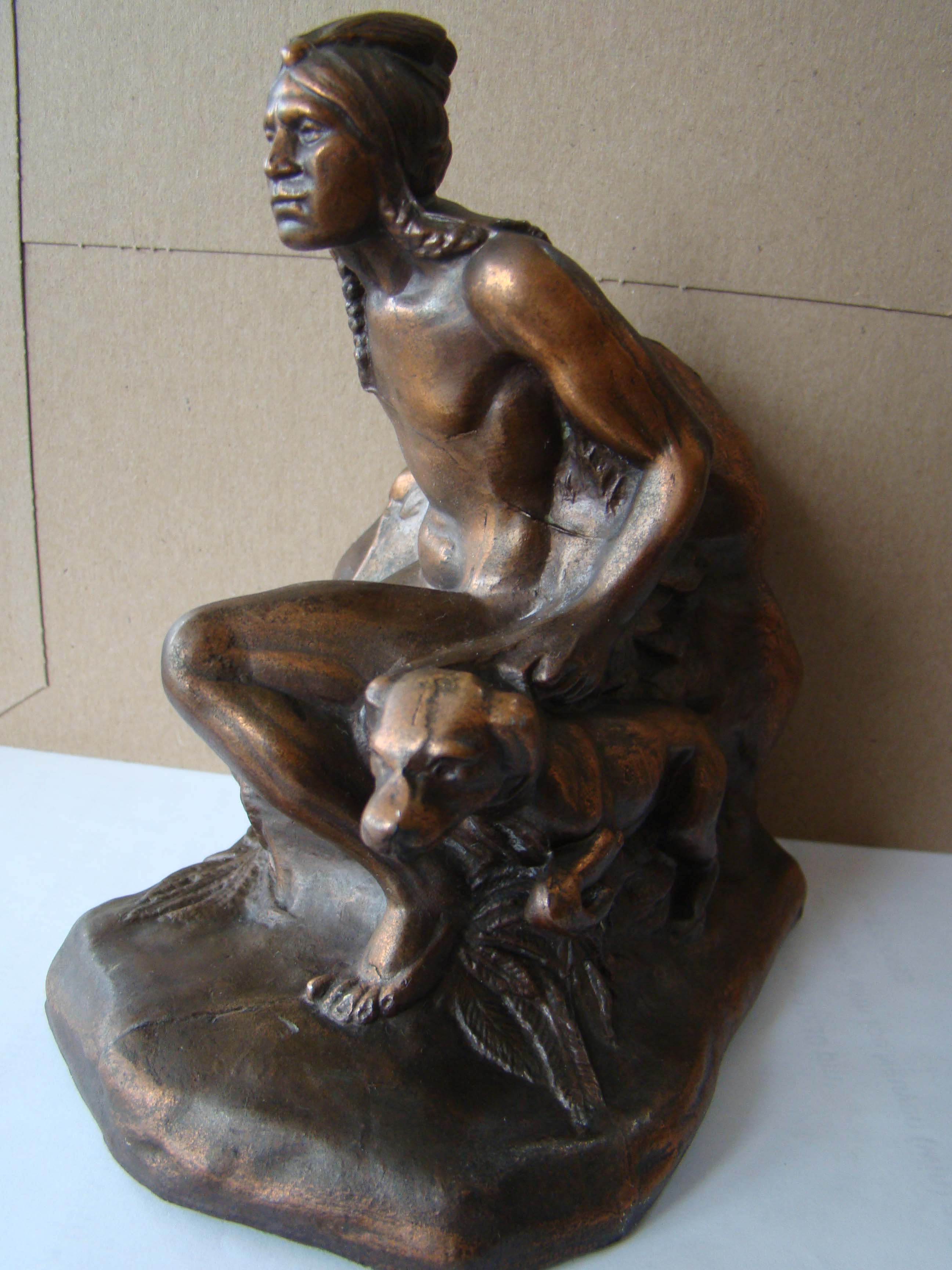 A single vintage bookend made circa 1930 depicting an Indian and his dog stalking prey — image 2