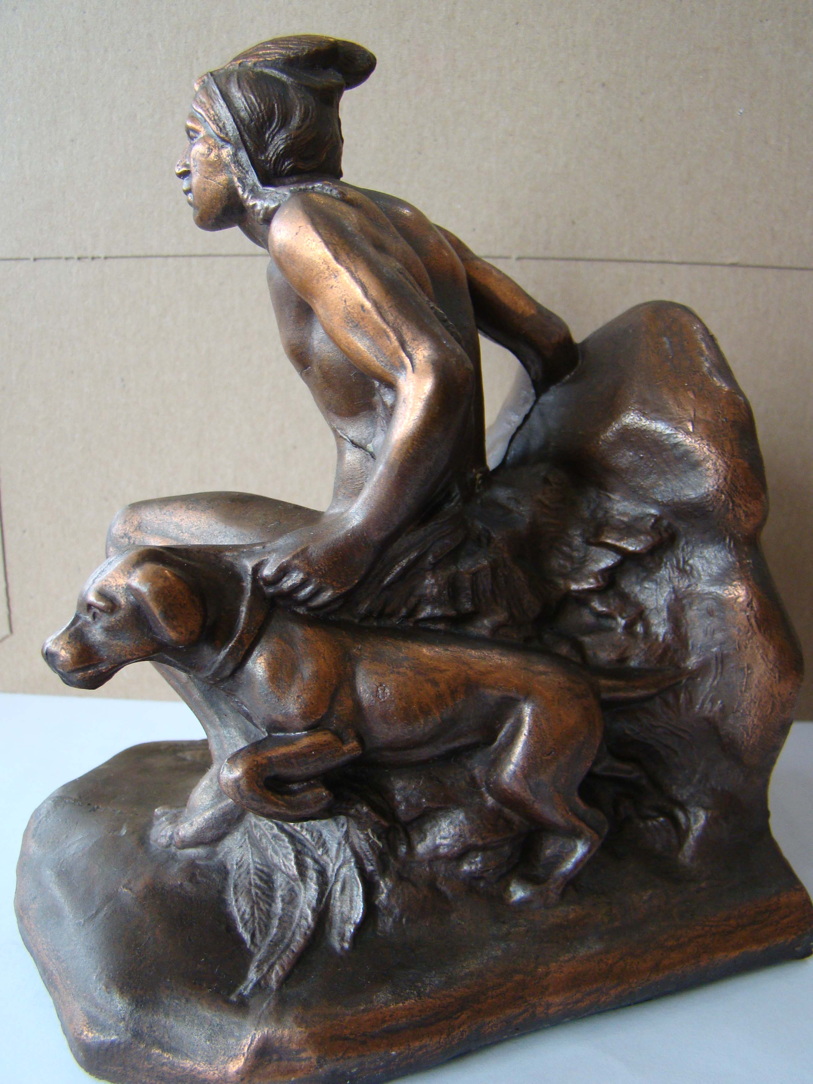 A single vintage bookend made circa 1930 depicting an Indian and his dog stalking prey — image 3