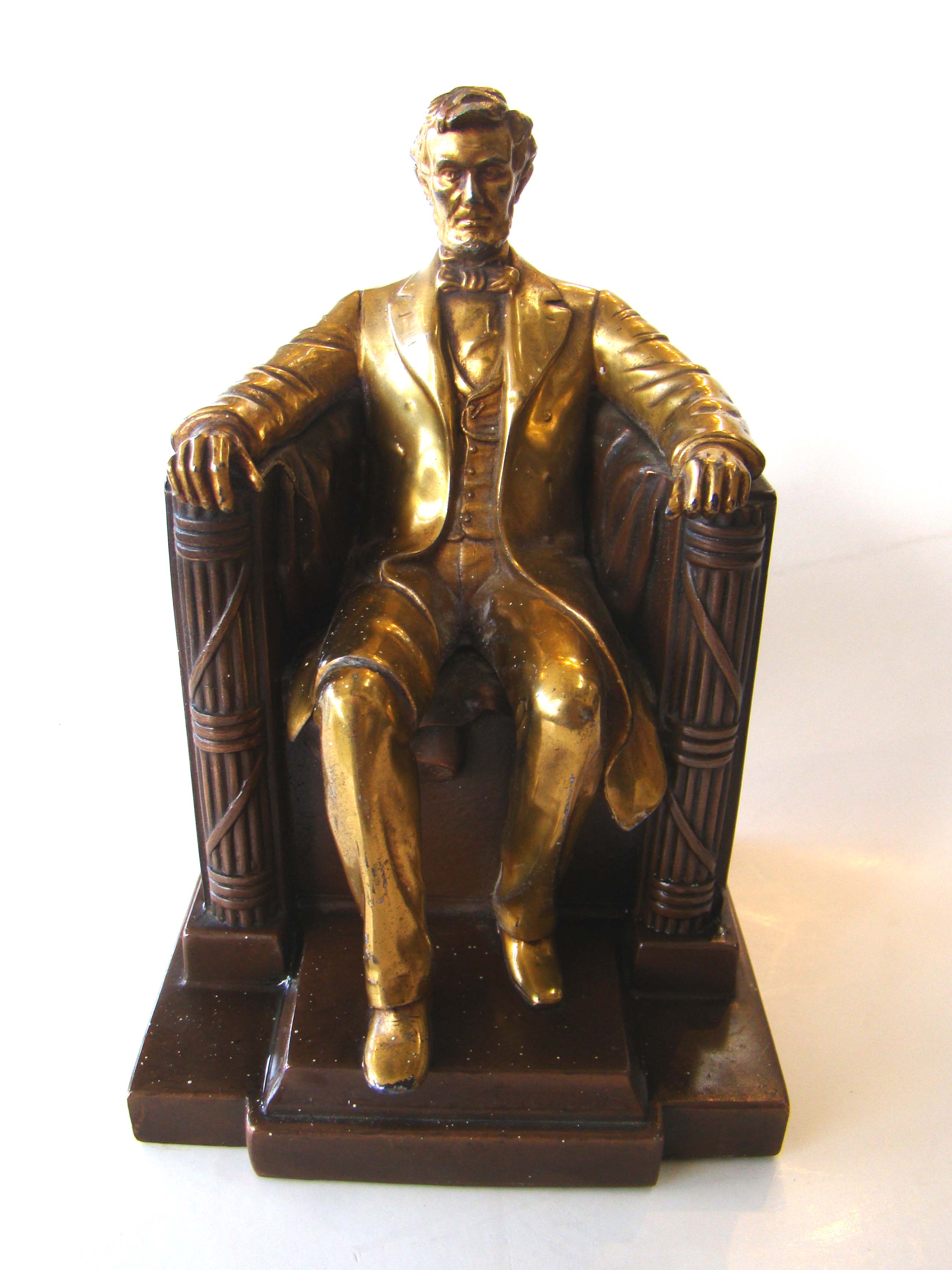 A fine single bookend made circa 1930 depicting Abraham Lincoln sitting in his chair — image 2