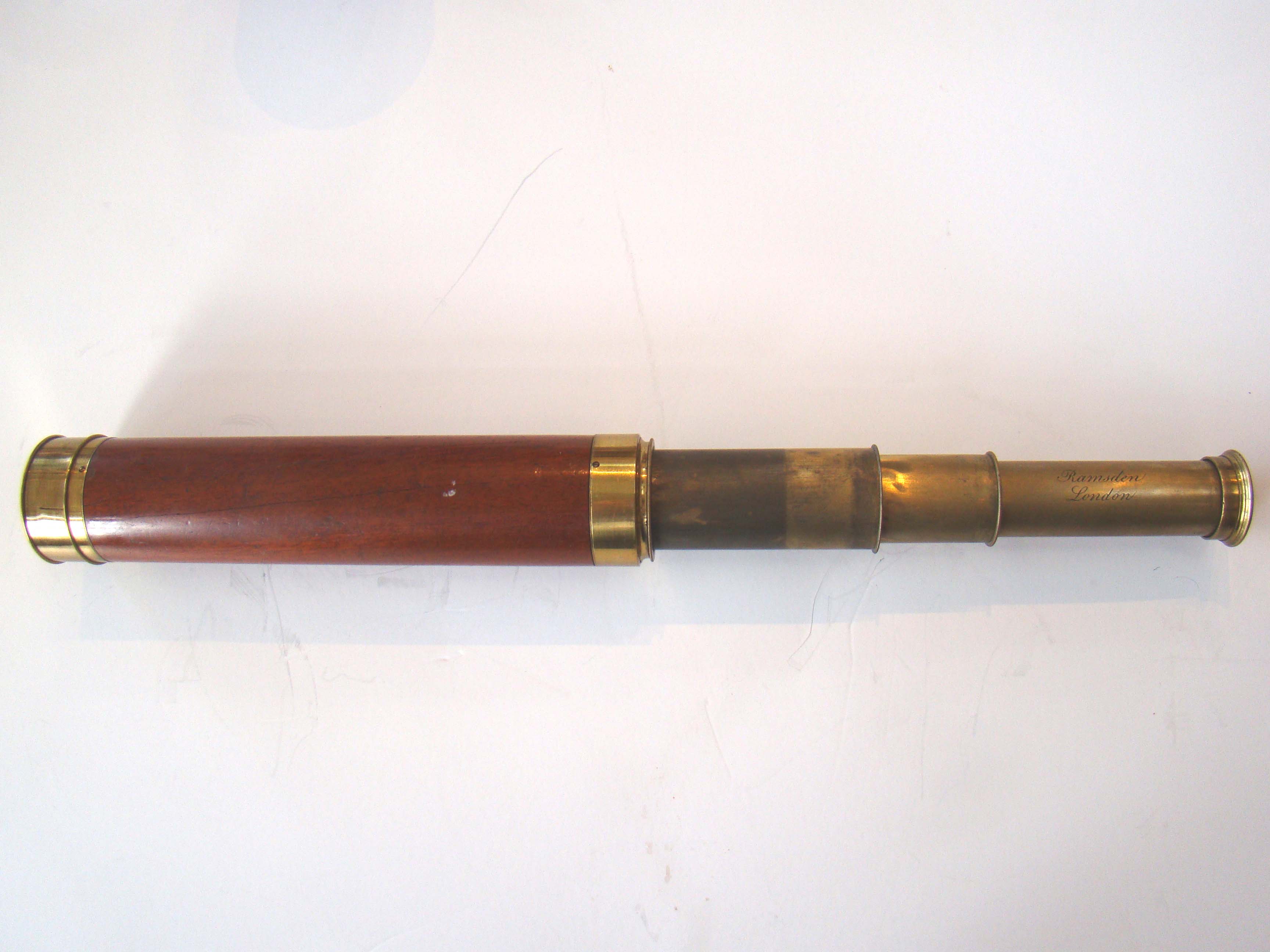 A fine 18th century three-draw telescope with mahogany barrel made circa 1780 by Jesse Ramsden of London.