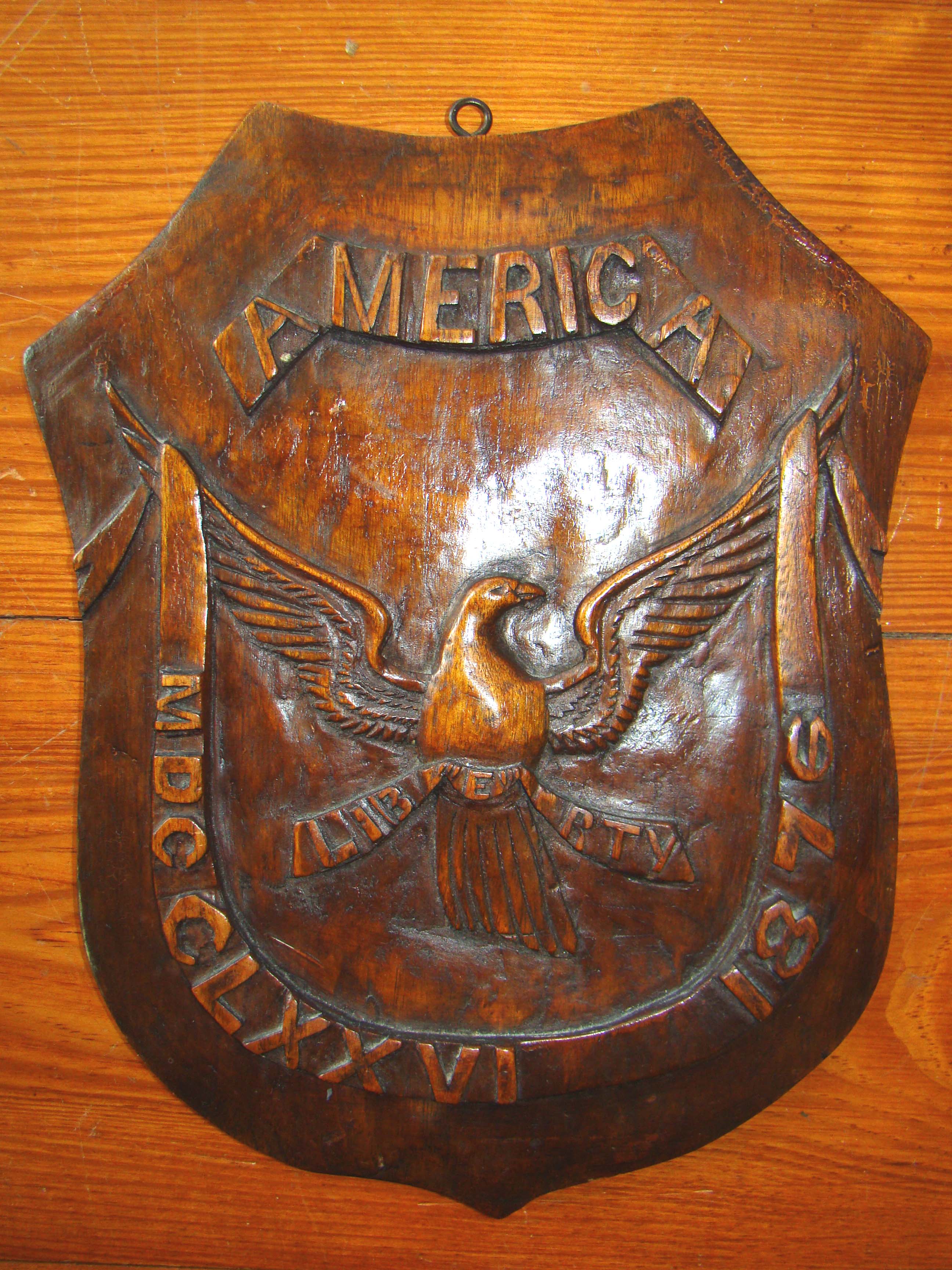 A FABULOUS relief carved American Centennial plaque dated 1876