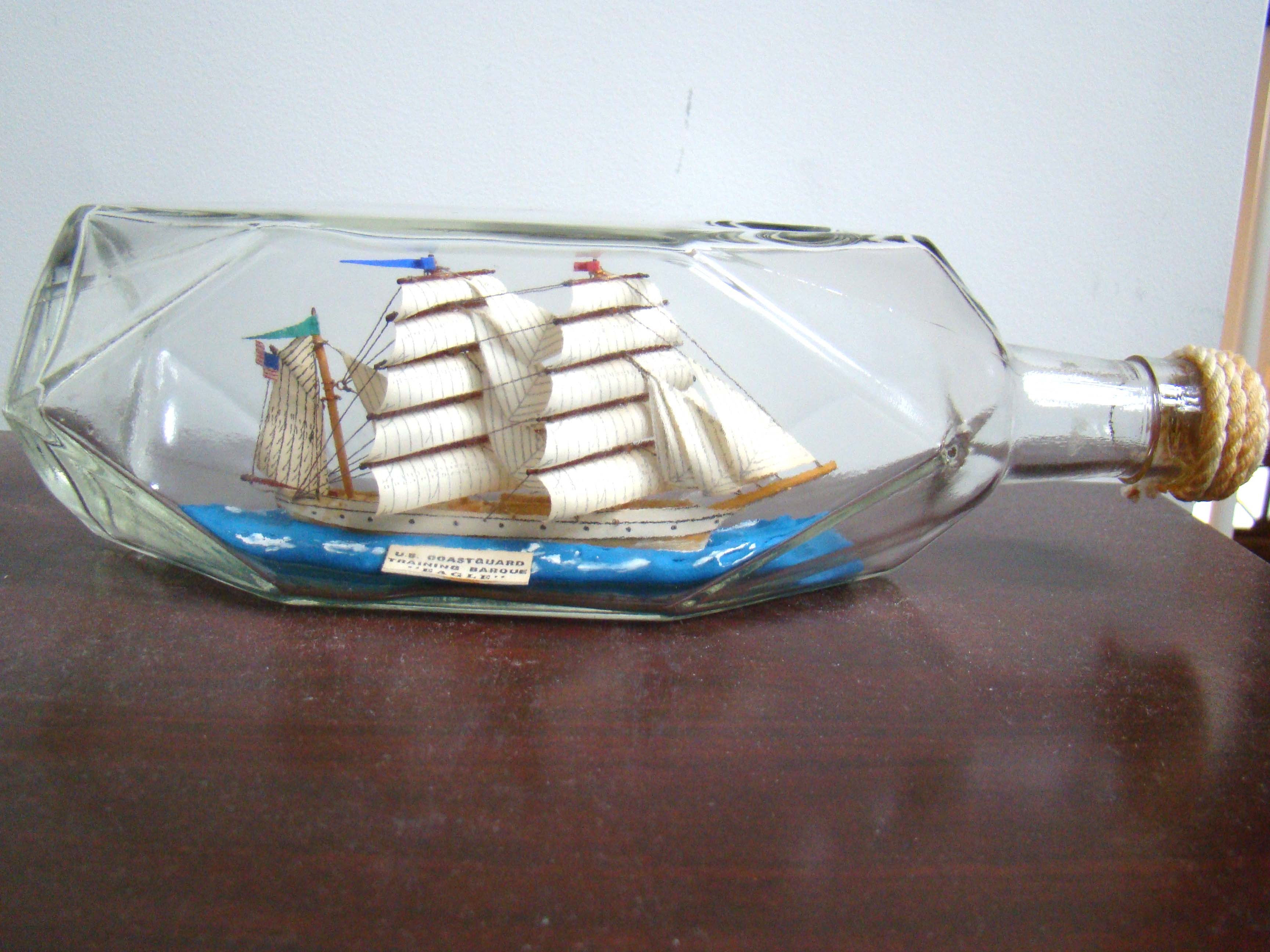 A fine vintage SHIP-IN-A BOTTLE depicting the U S Coast Guard Academy's sail training ship the EAGLE — image 3