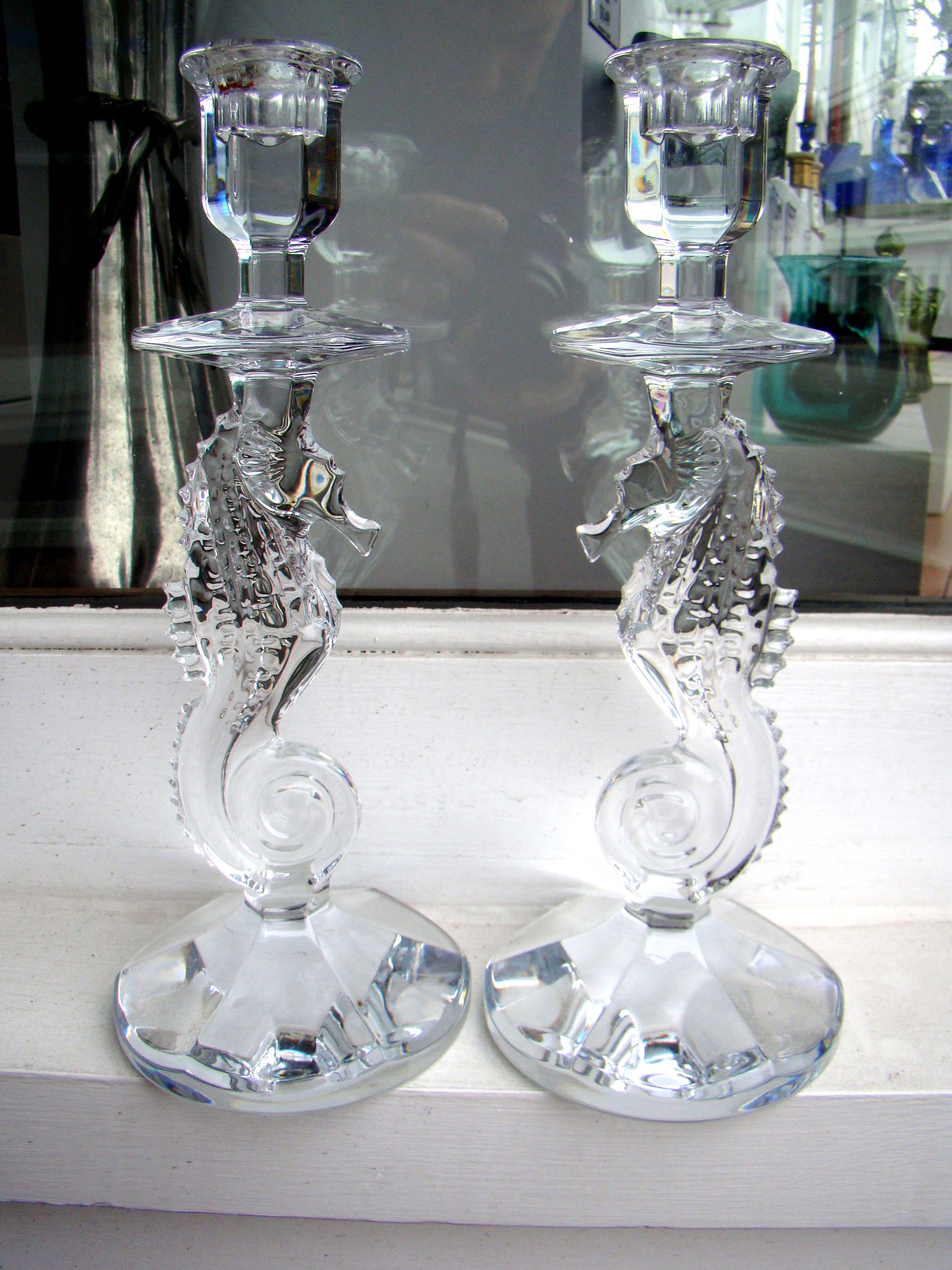 A gorgeous pair of signed "WATERFORD" crystal "SEA HORSE" candlesticks