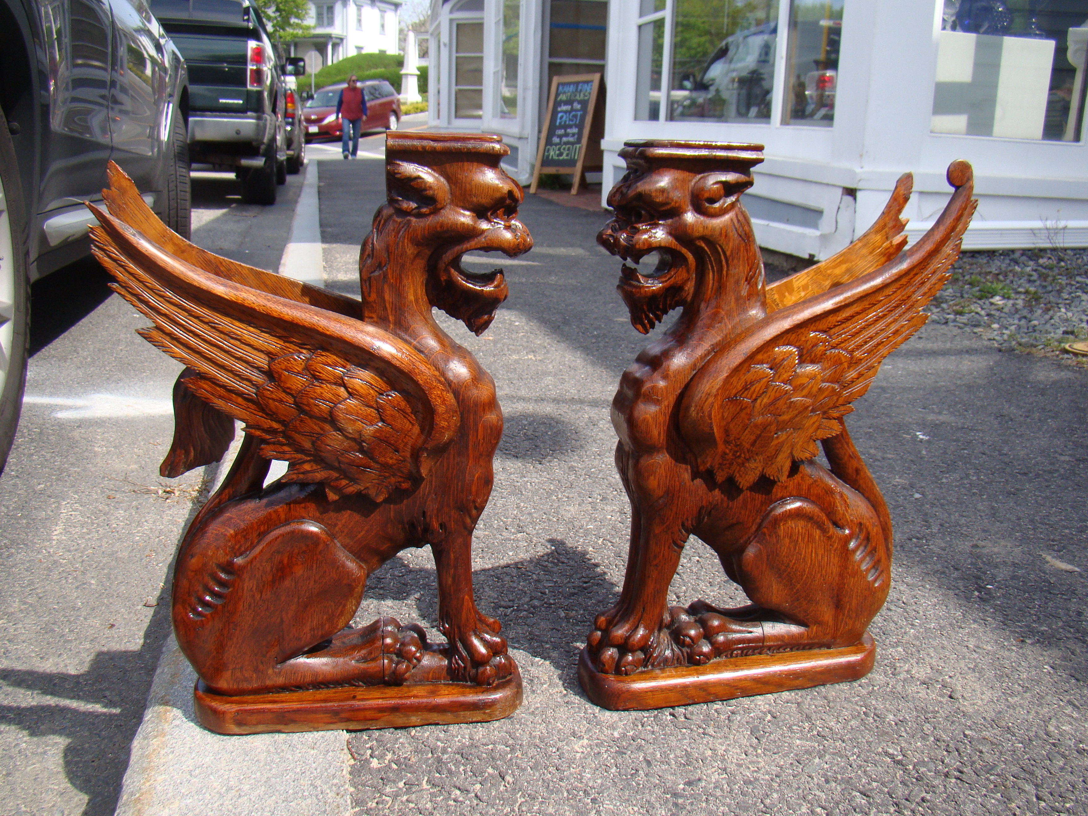 A wonderful pair of hand carved neoclassical Griffins circa 1850