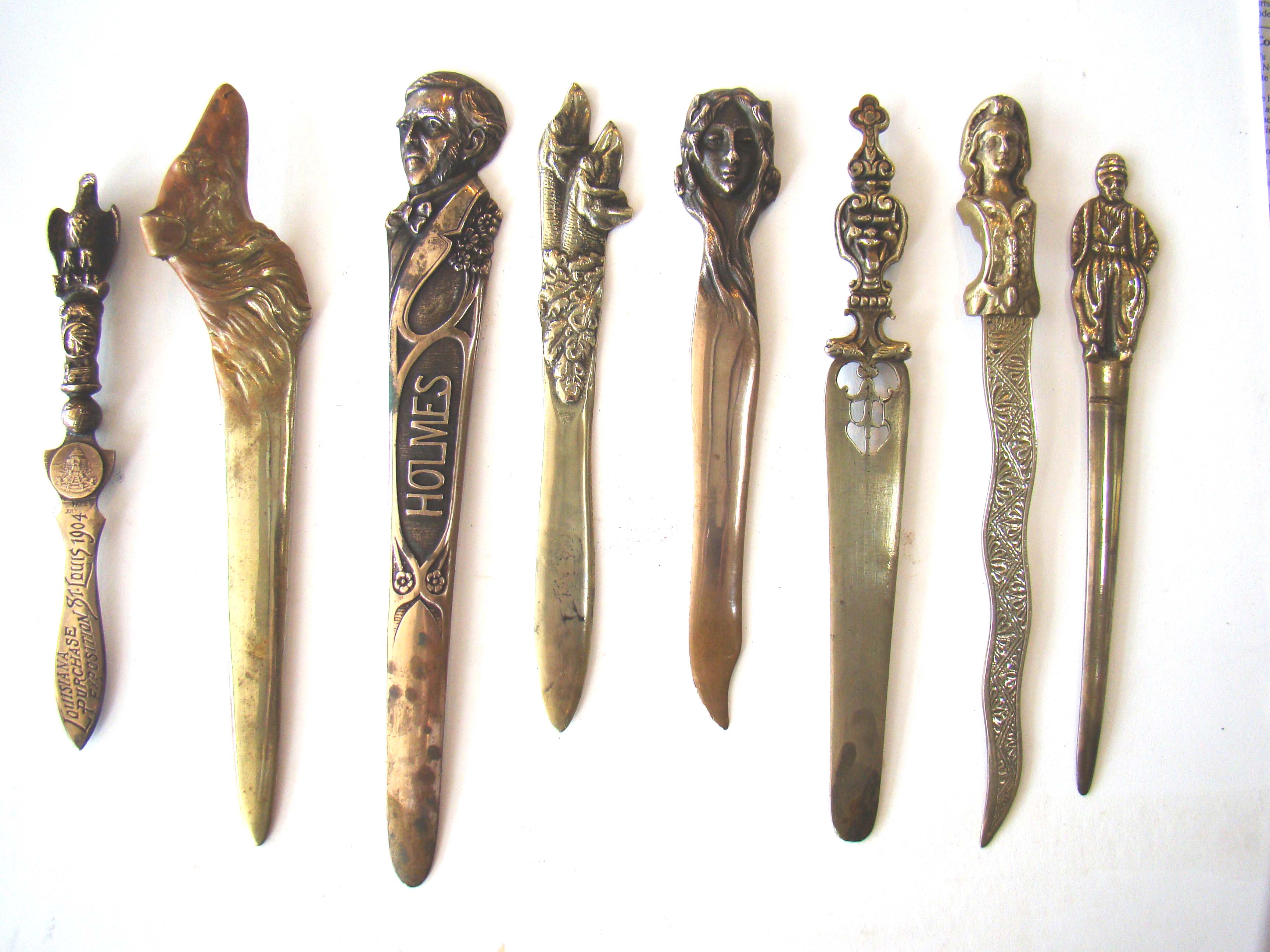A rare collection of  eight brass letter openers circa 1875 to 1920