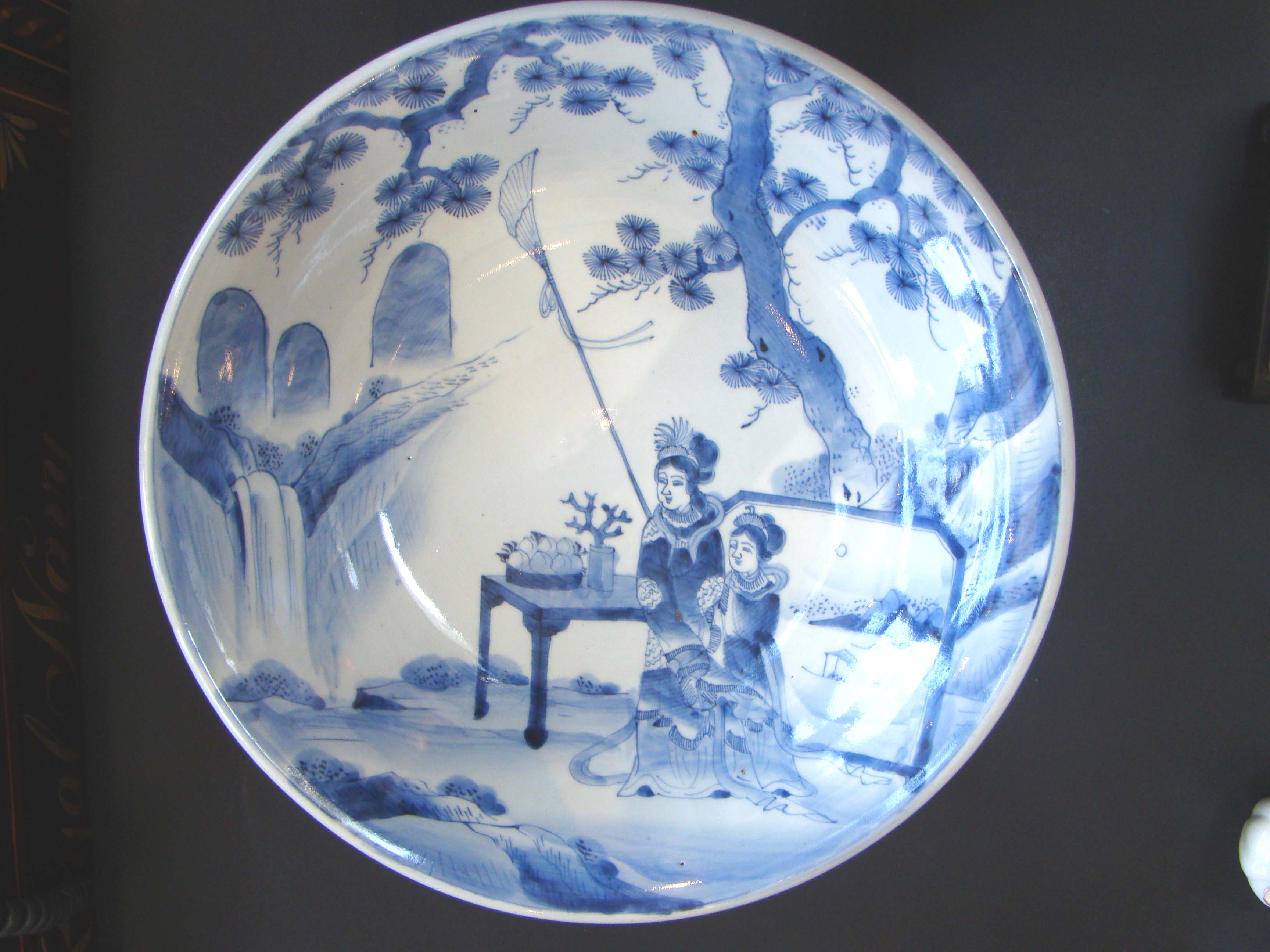 A fine 19th century Japanese low bowl with 15" diameter featuring a mother and her daughter
