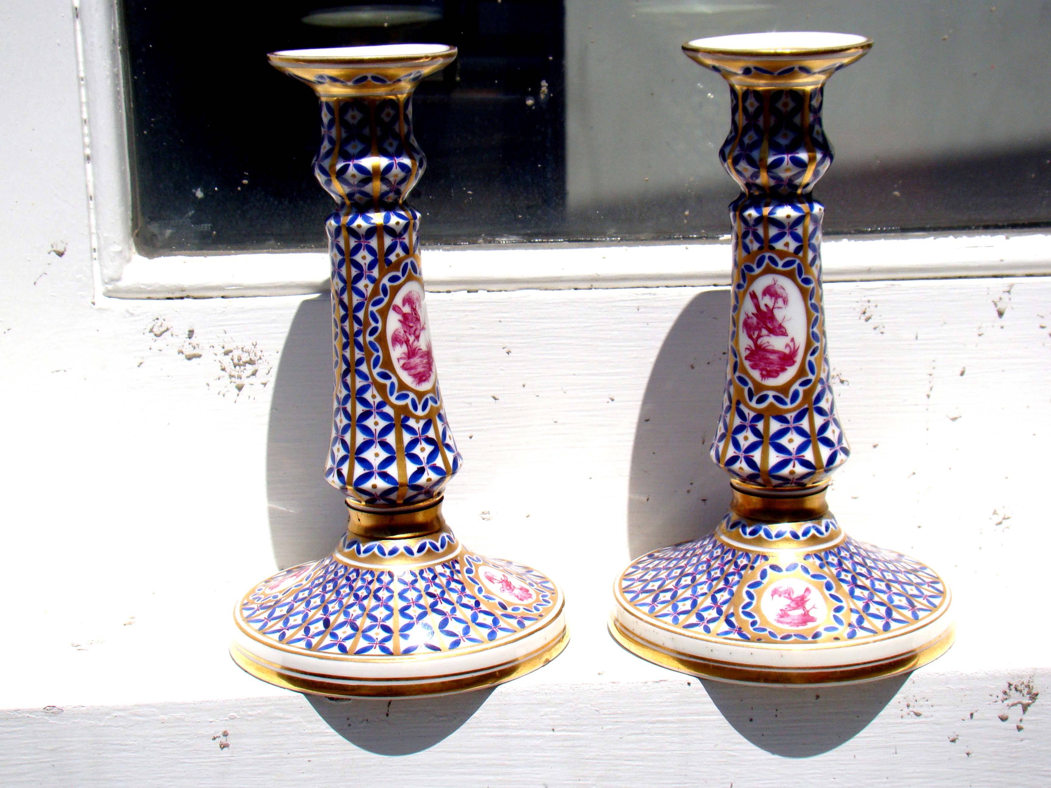 A beautiful pair of 18th century style Dresden candlesticks made circa 1890