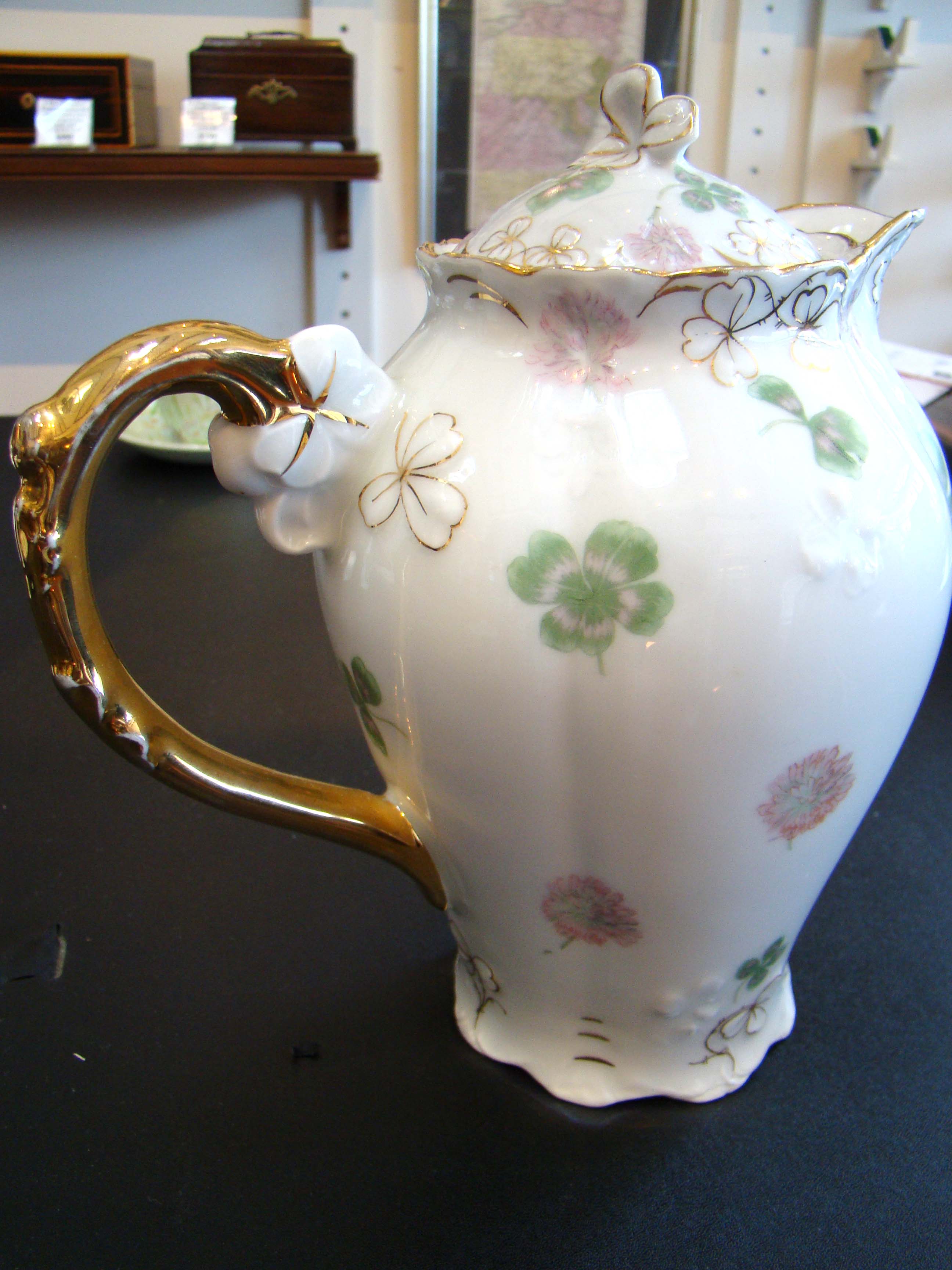A fabulous vintage "GOOD LUCK" German porcelain tea/coffee pot with three matching cups & saucers — image 2
