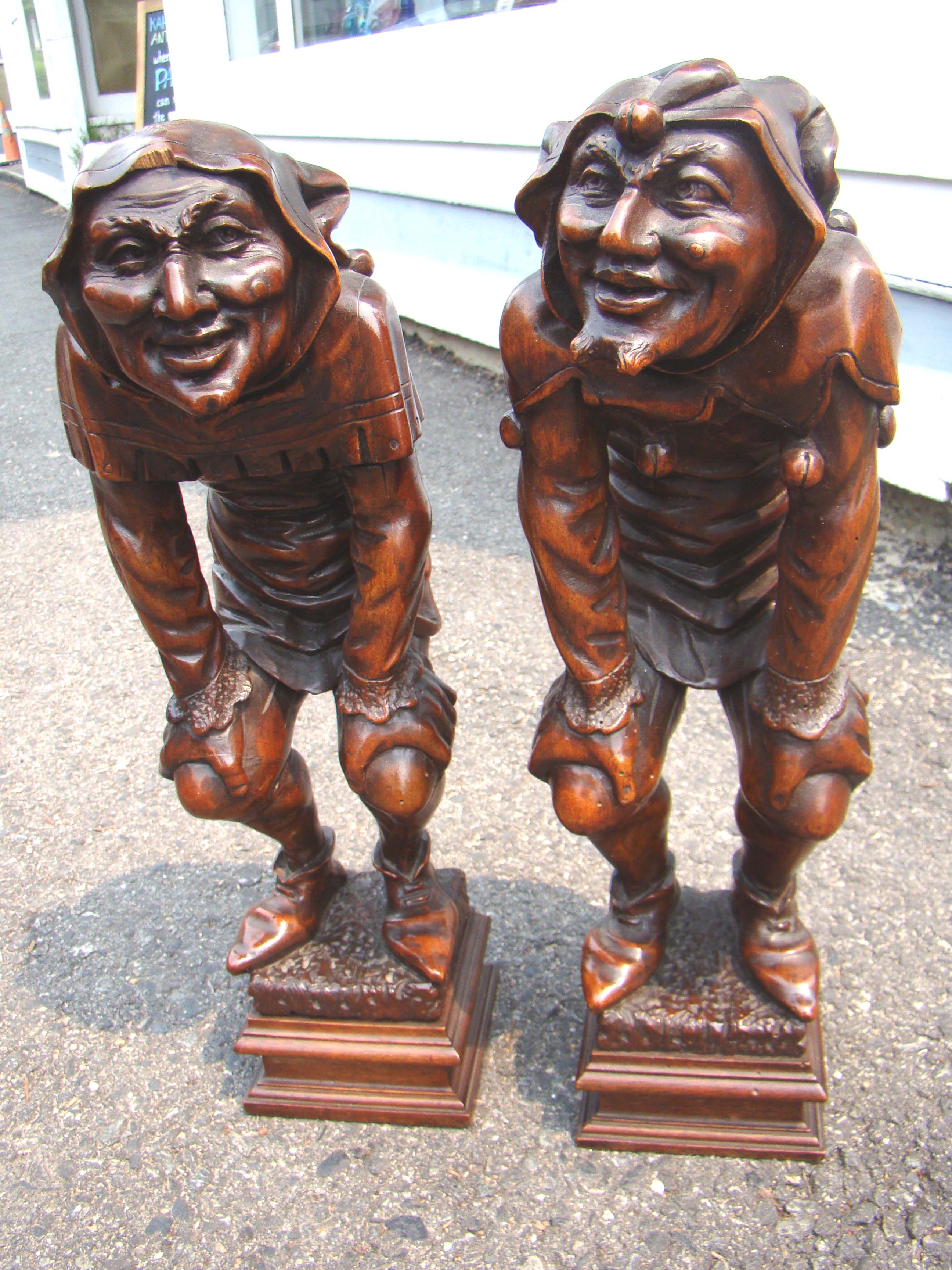 An exceptionally fine and RARE pair of 18th  century French carved walnut "King's Fool" figures