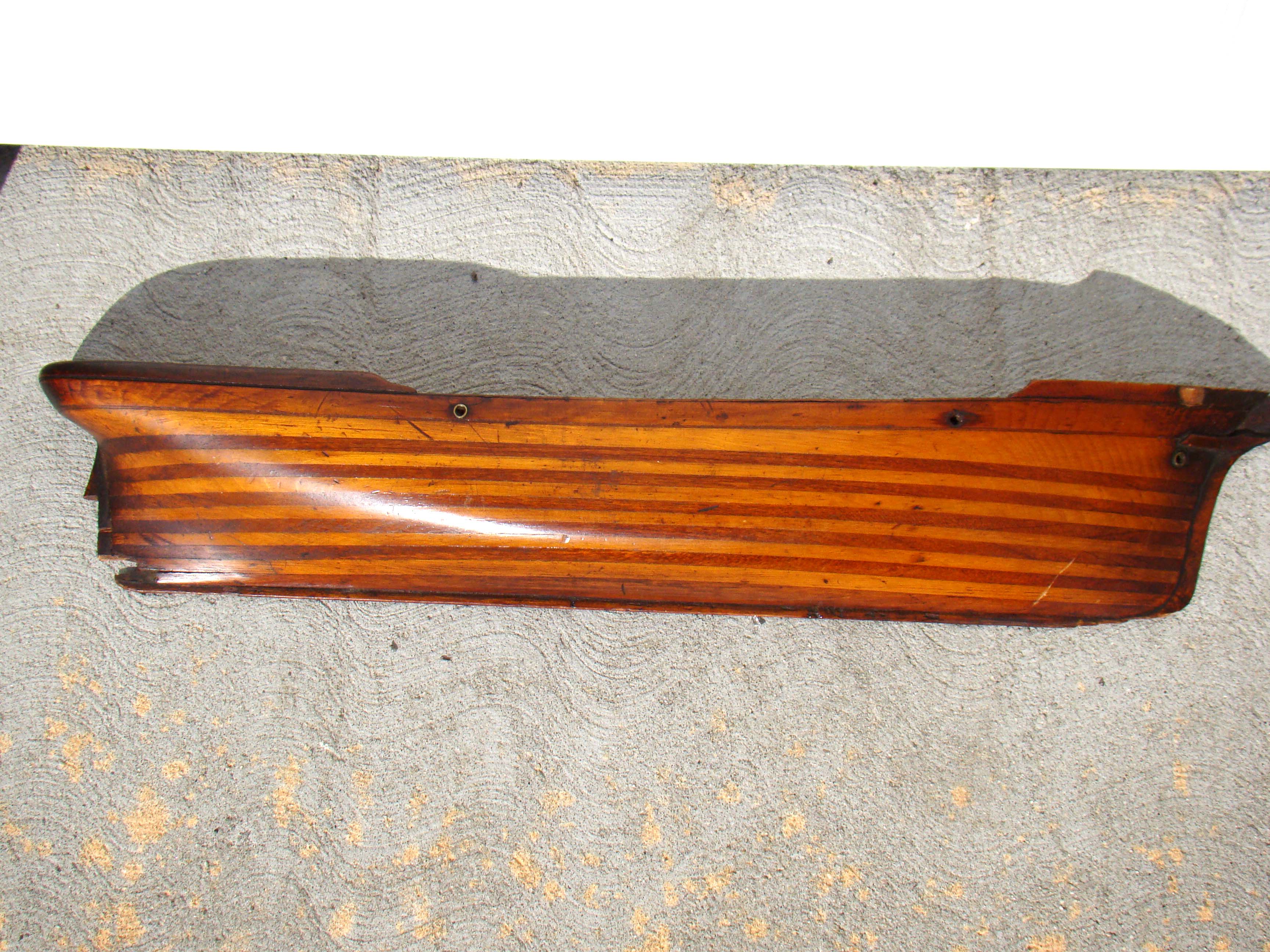 A wonderful 19th century half-hull model circa 1840 built up with 13 contrasting wood lifts.