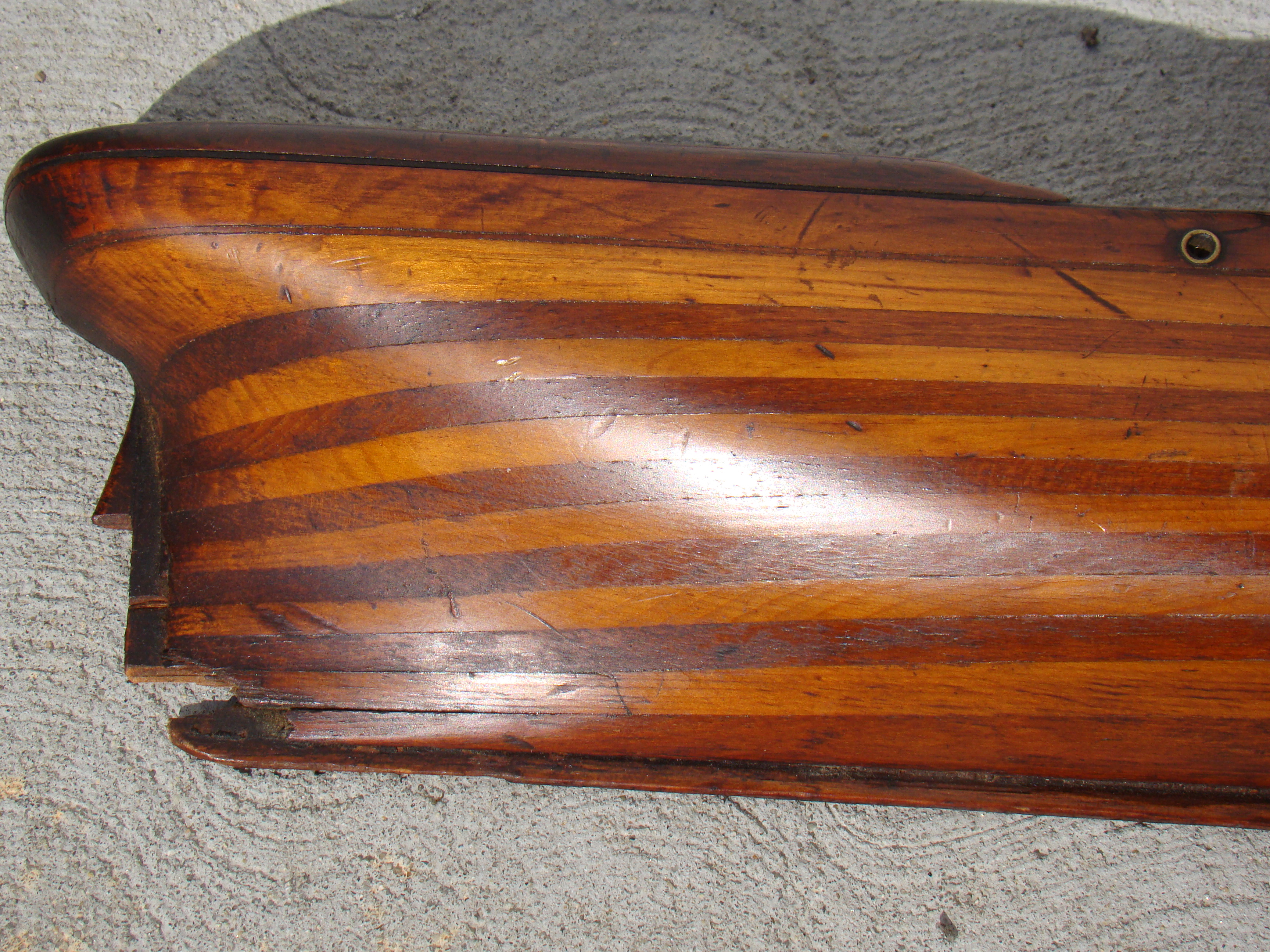 A wonderful 19th century half-hull model circa 1840 built up with 13 contrasting wood lifts. — image 2