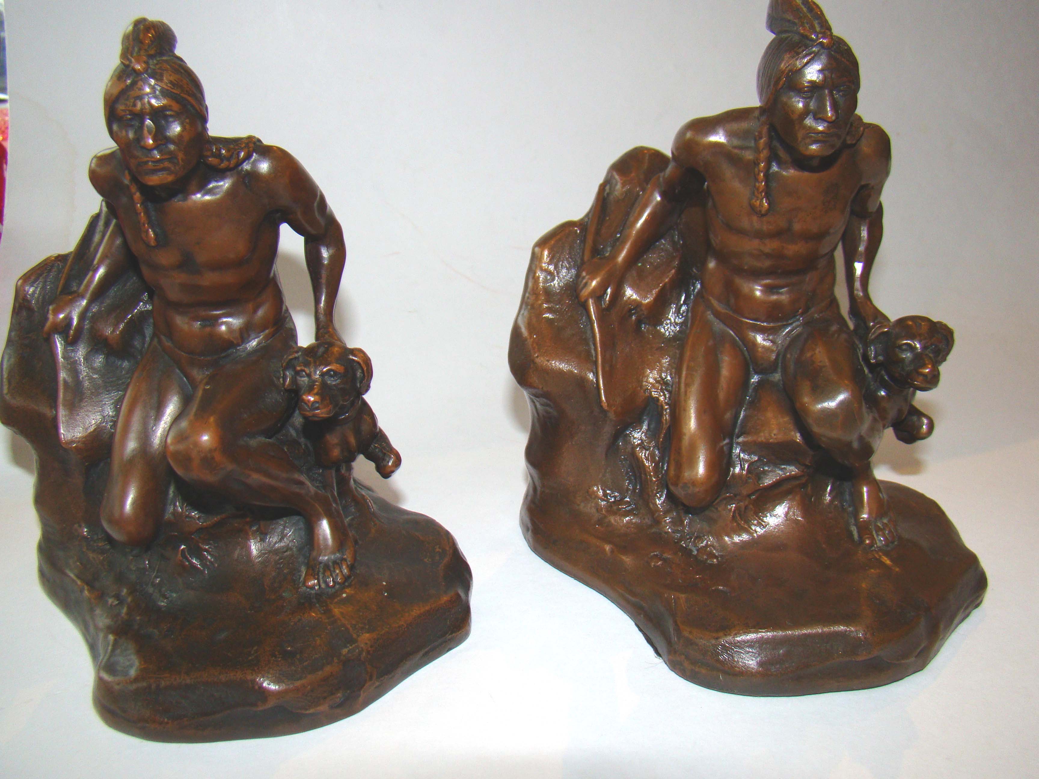 A very attractive pair of vintage bookends depicting a Native American hunting with his dog by his side. Made by Jennings Brothers circa 1935
