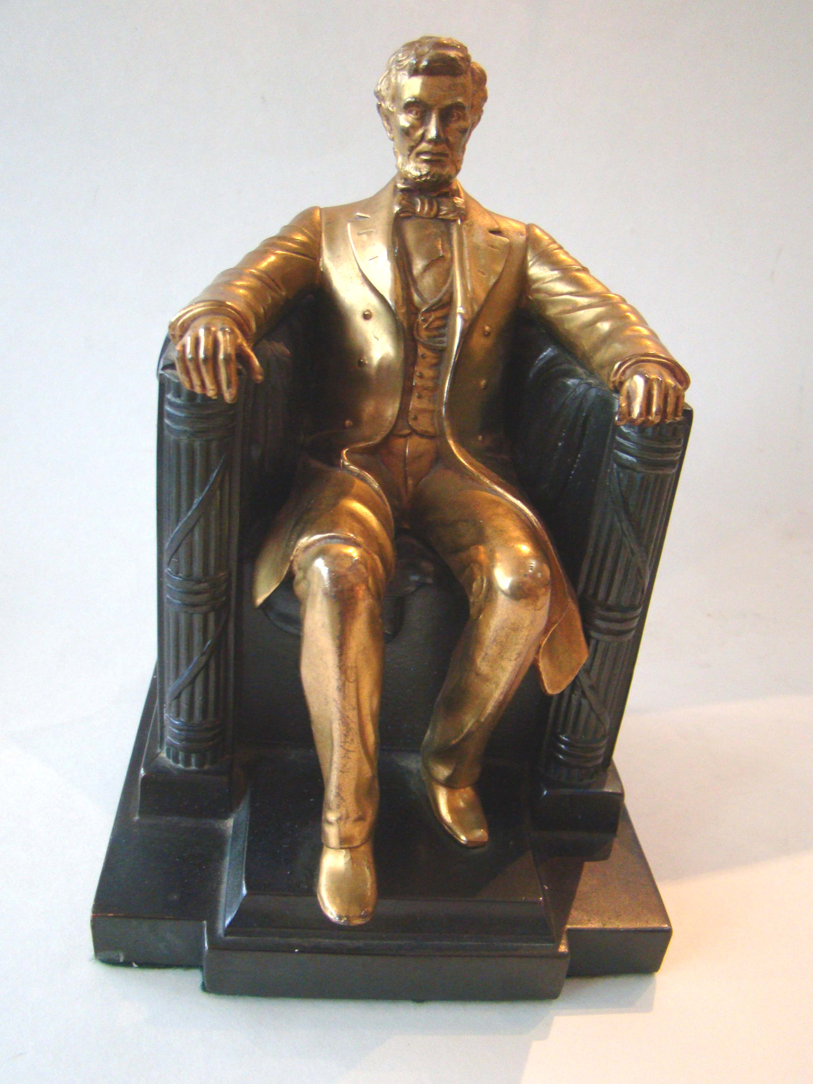 A fine single Abraham Lincoln 'sitting in his chair" bookend made by Jennings Brothers circa 1930