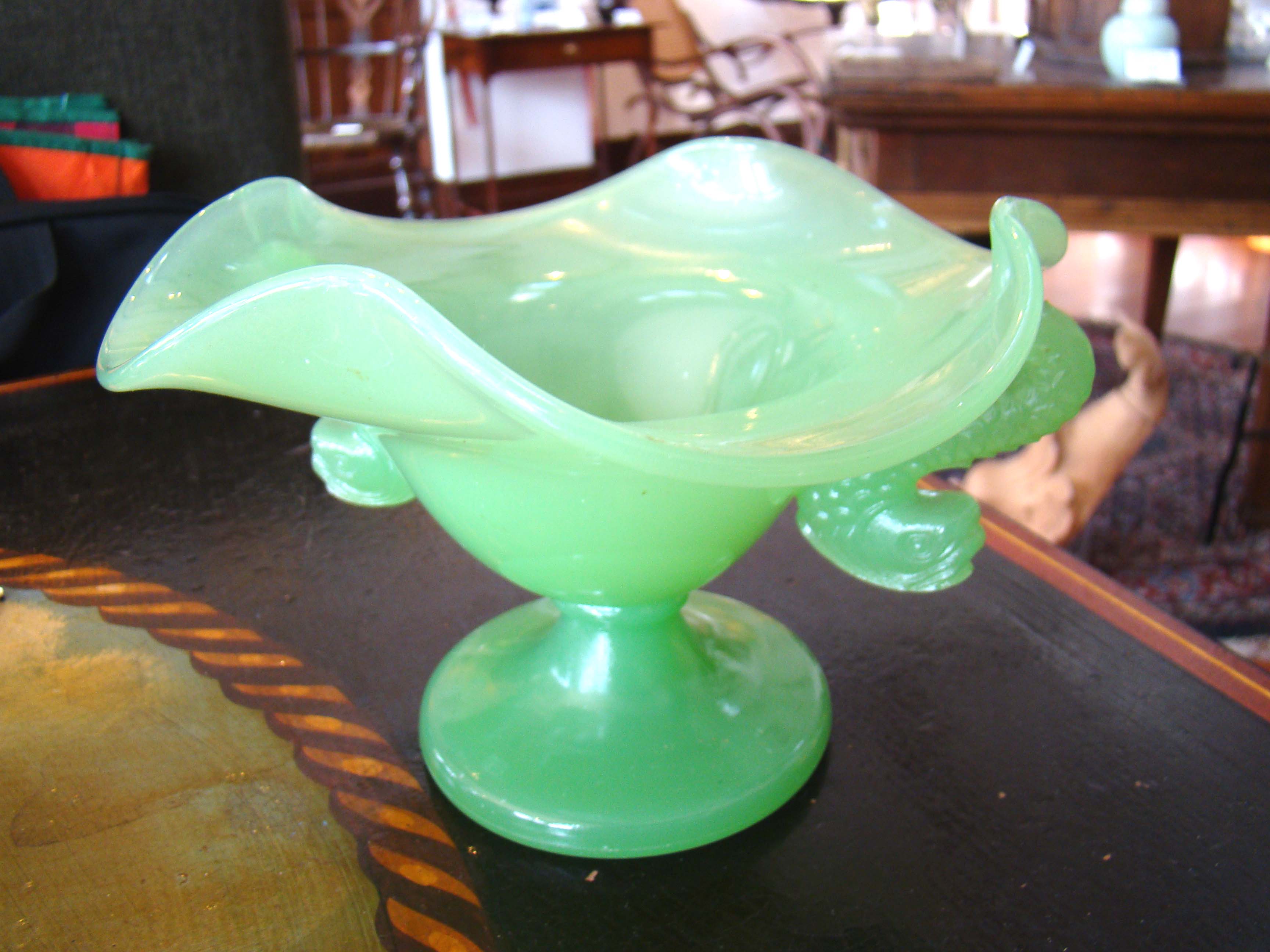 A beautiful vintage Fenton Jadeite bowl with dolphin handles