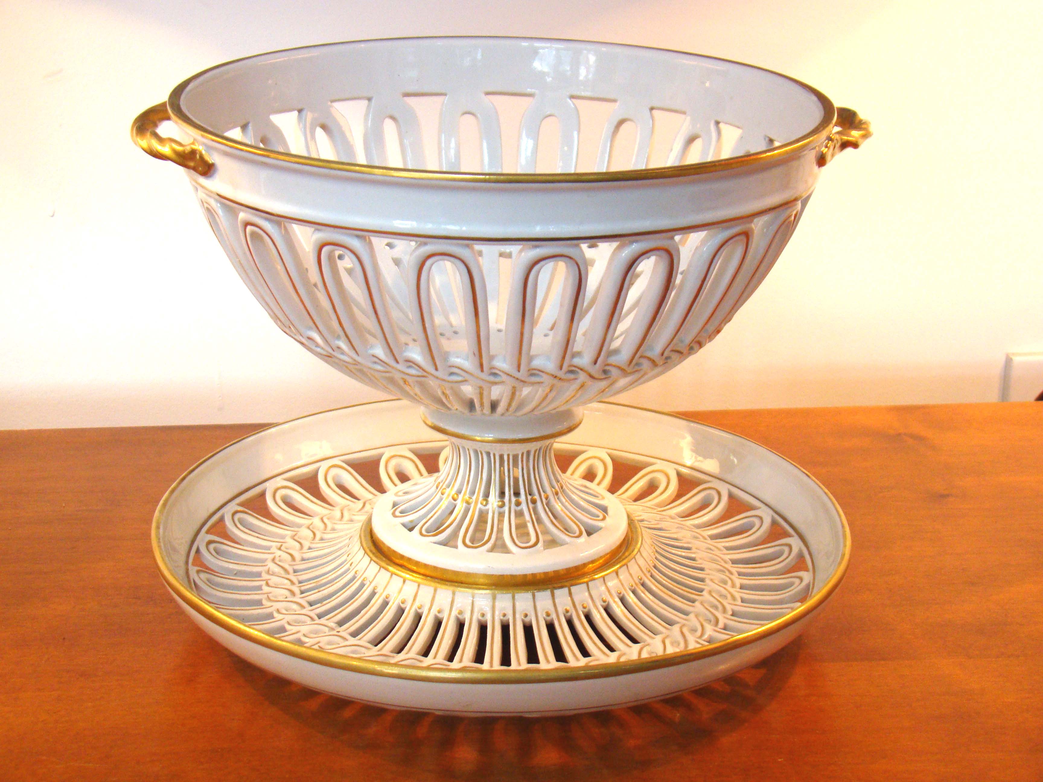 A beautiful vintage "OLD PARIS" style reticulated compote basket with matching undertray made by Mottahedeh