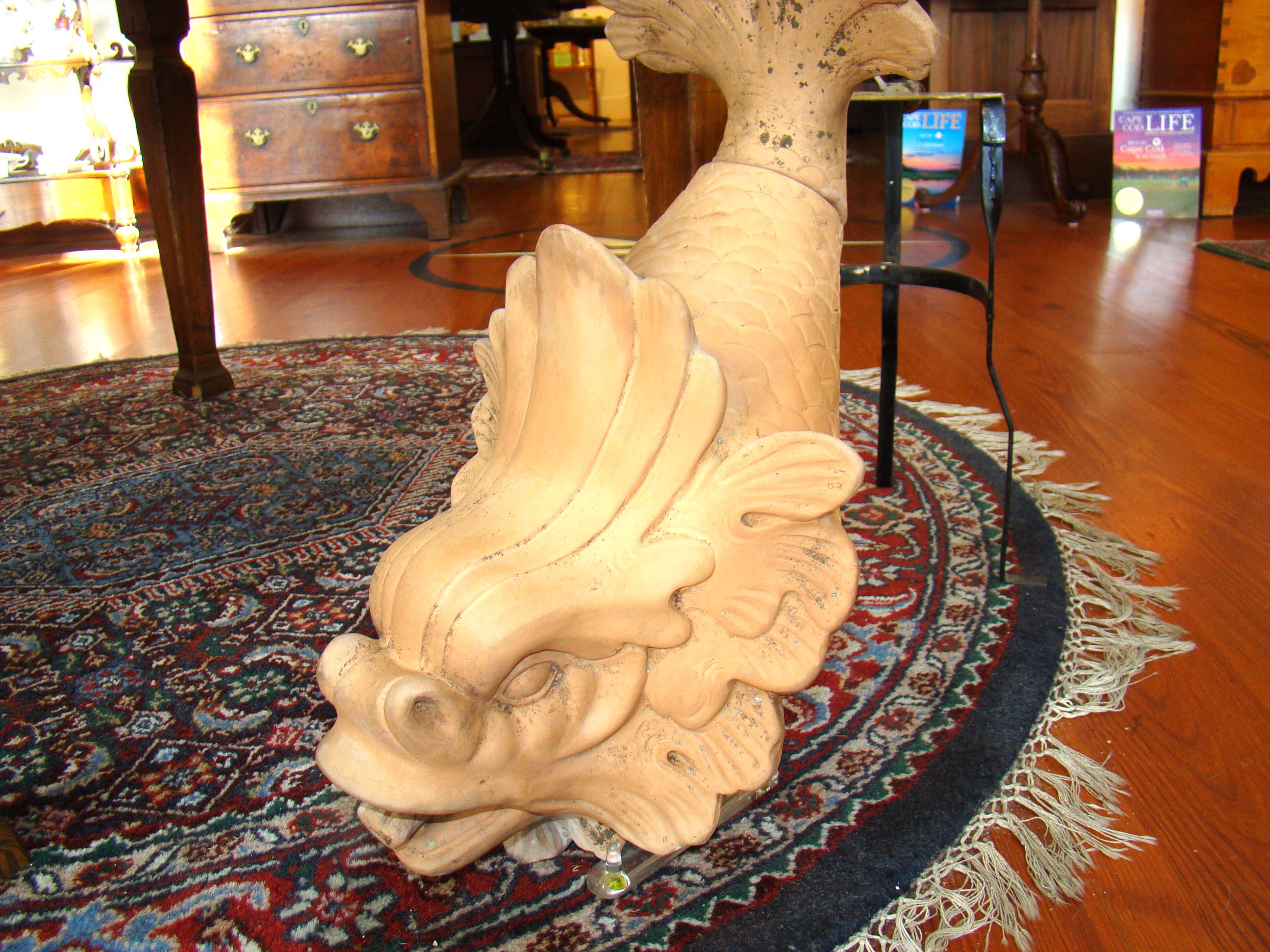 An attractive vintage terracotta dolphin/koi garden water pocket 