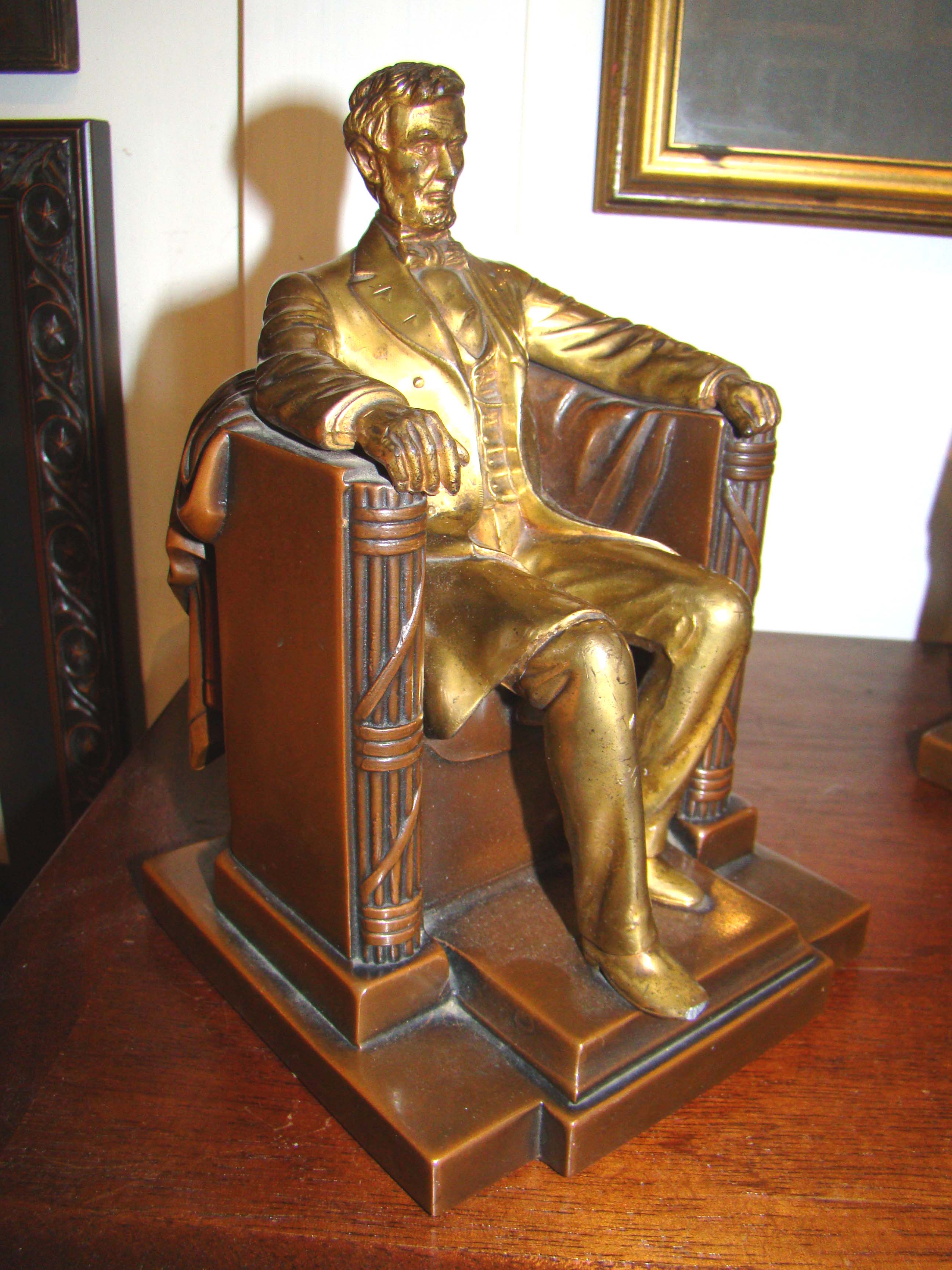 A good pair of vintage Abraham Lincoln 'sitting in the chair" bookends circa 1930 — image 2