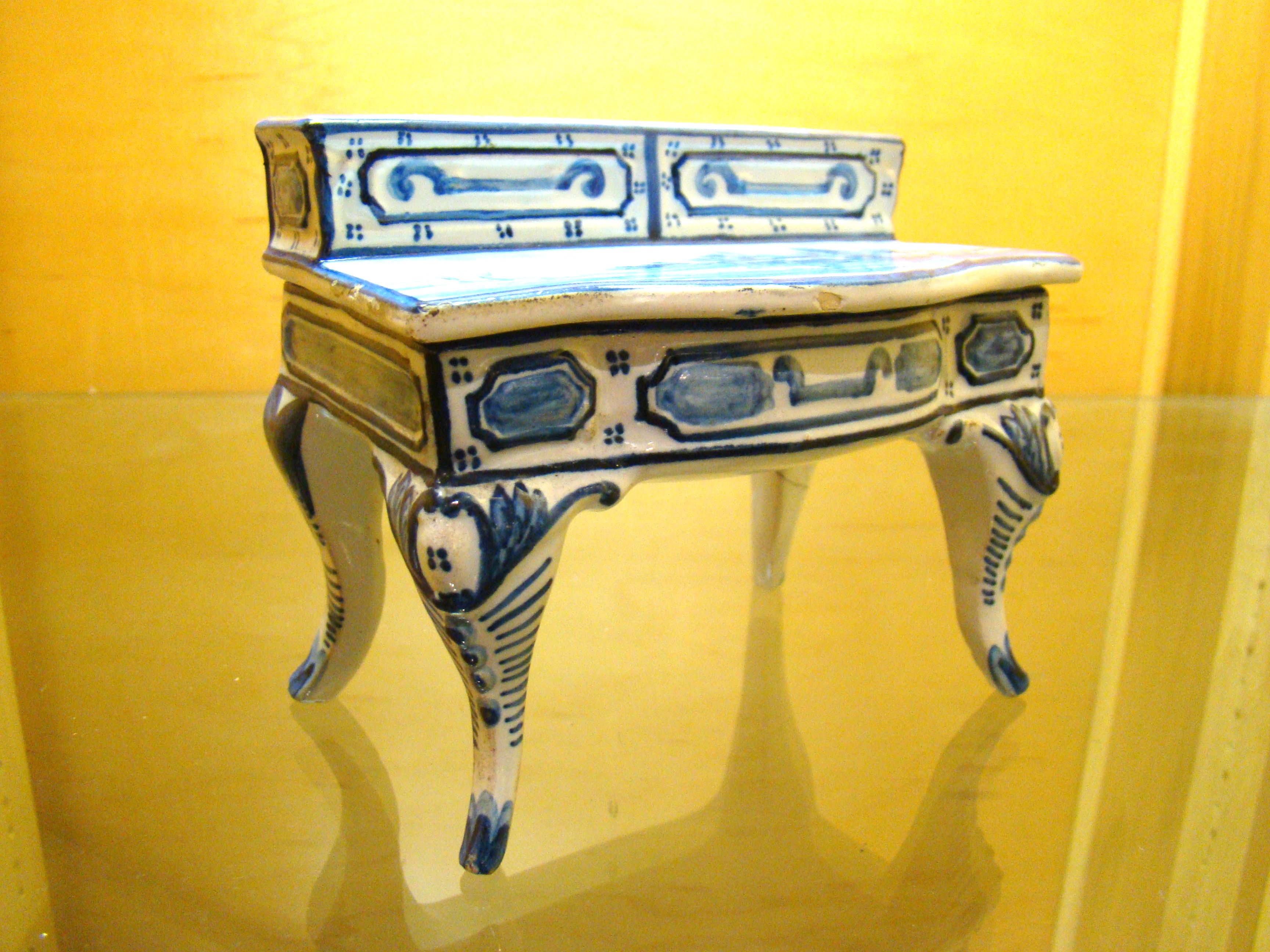 A charming 19th century Dutch Delft trinket box in the form of a desk