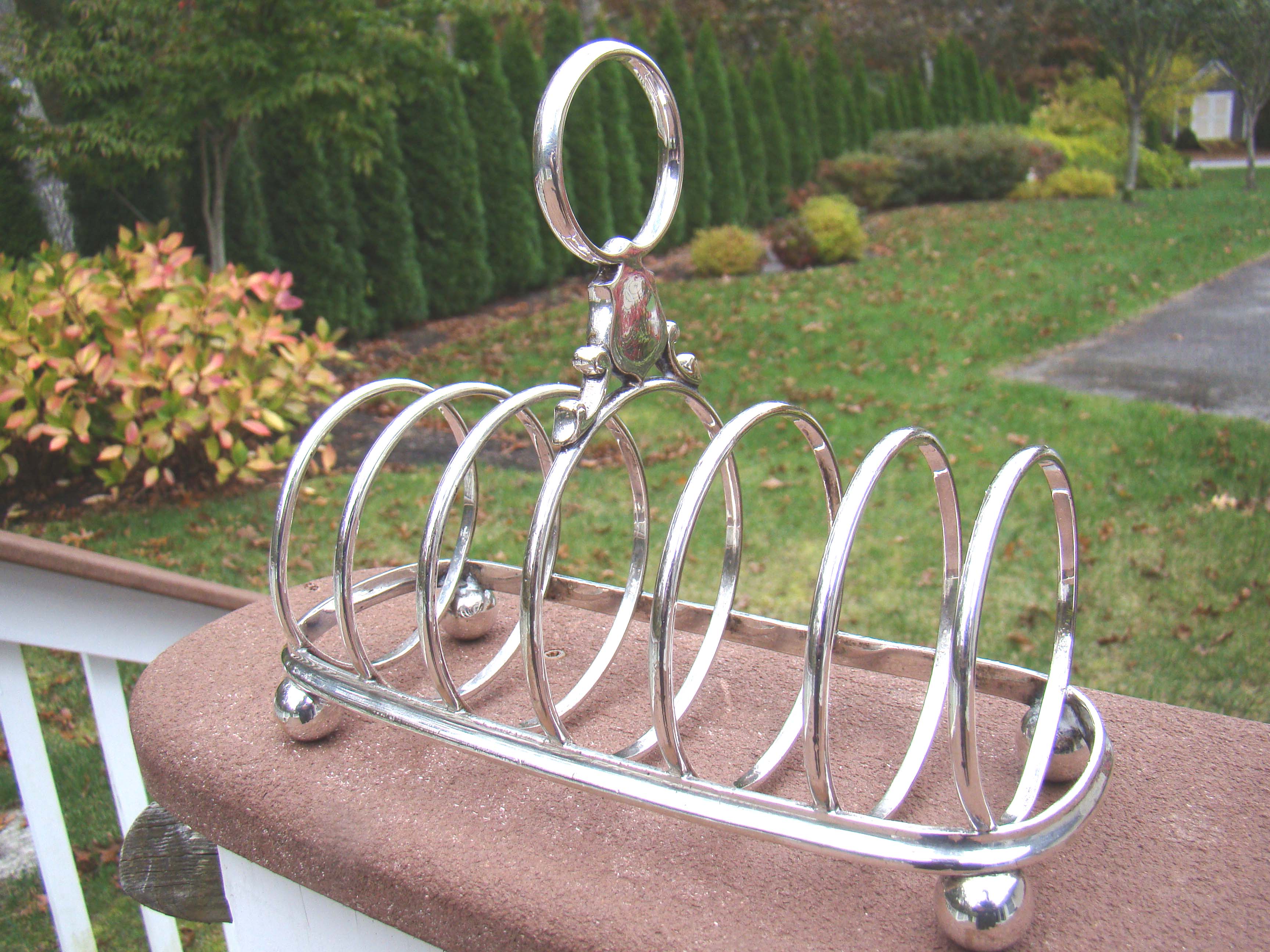 An English silver toast rack circa 1910