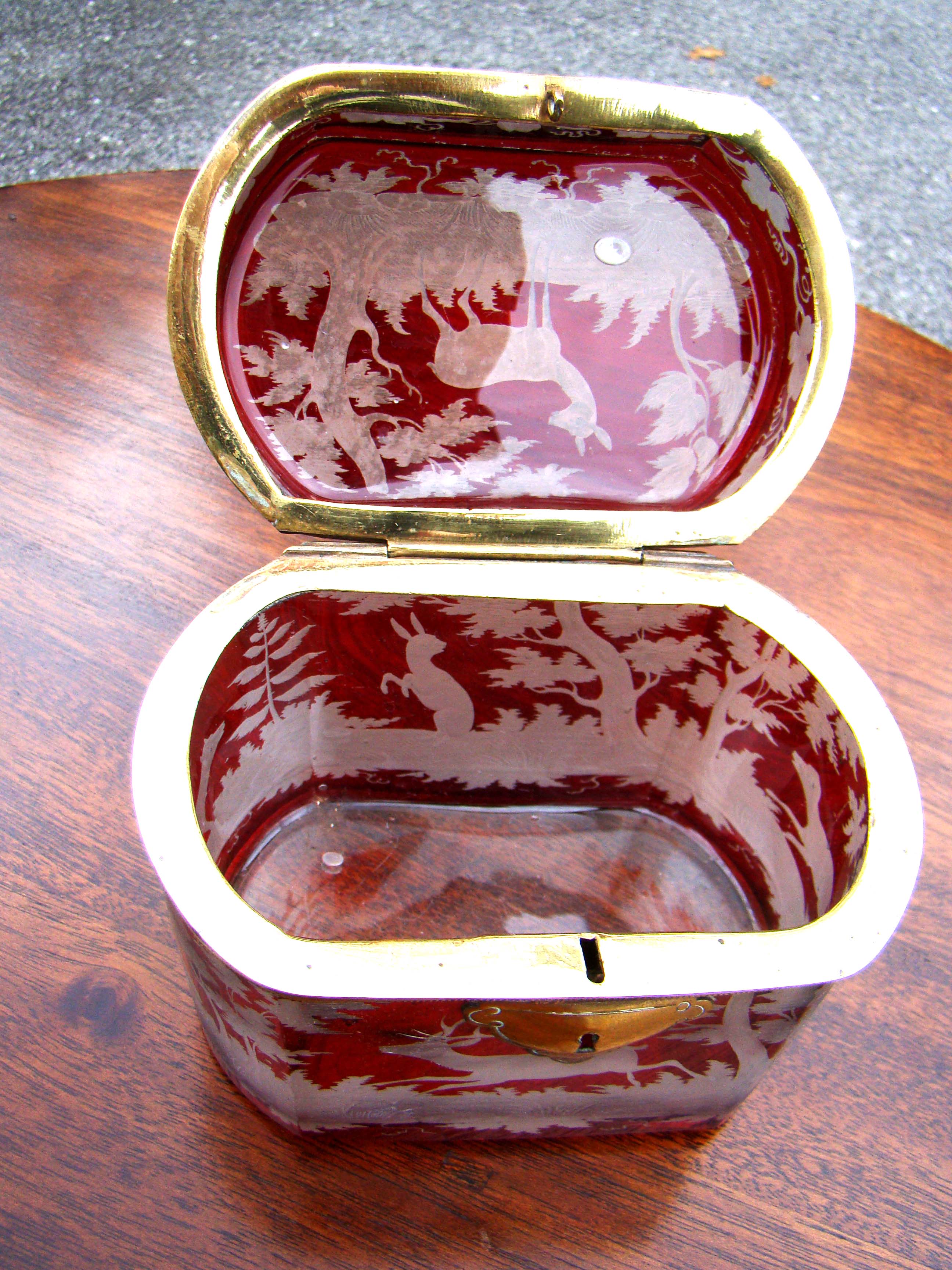 A extraordinary Bohemian ruby red cut to clear etched glass dresser box with gilt mounts circa 1870 — image 2