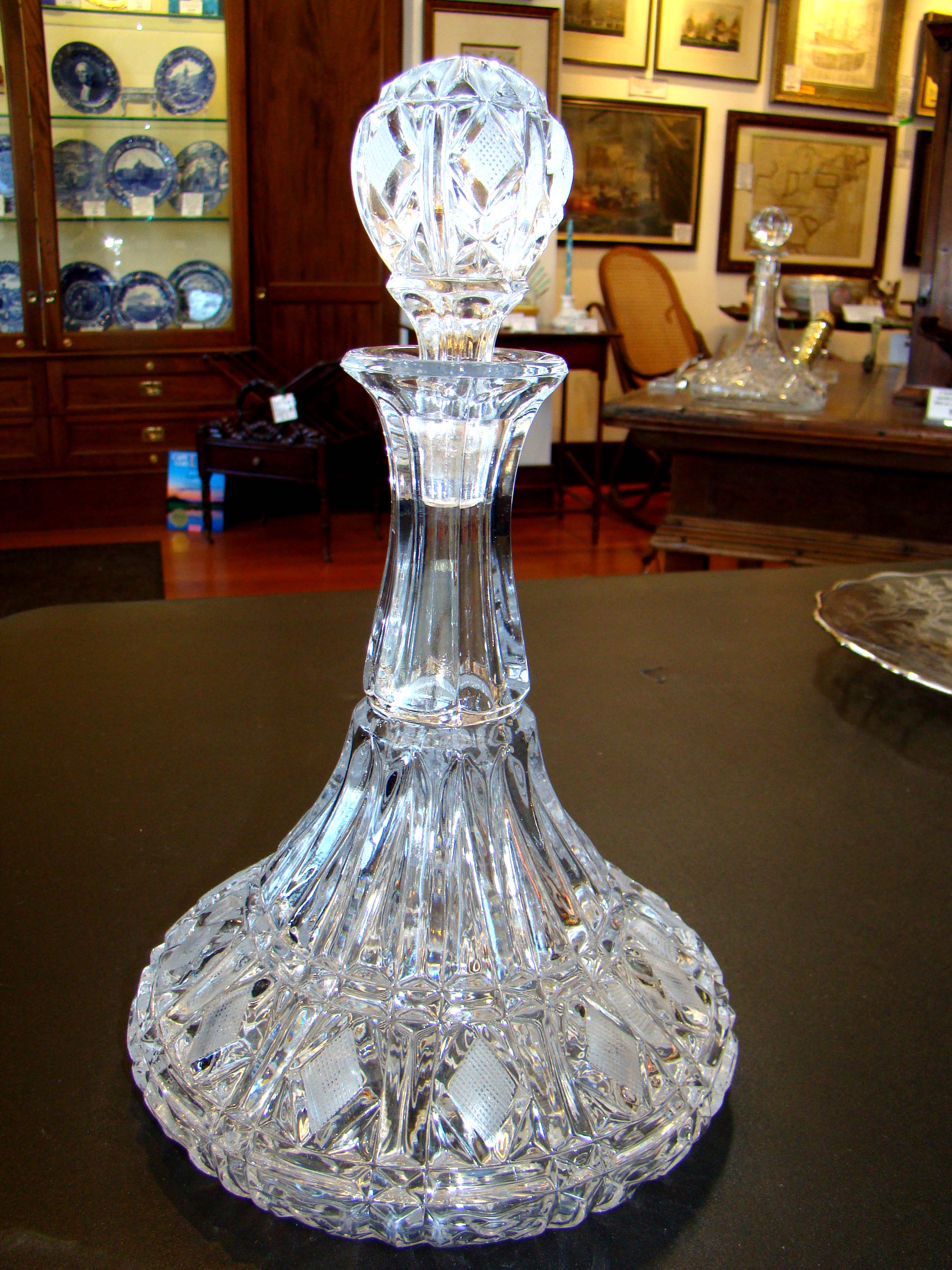 A beautiful vintage engraved crystal ship's decanter