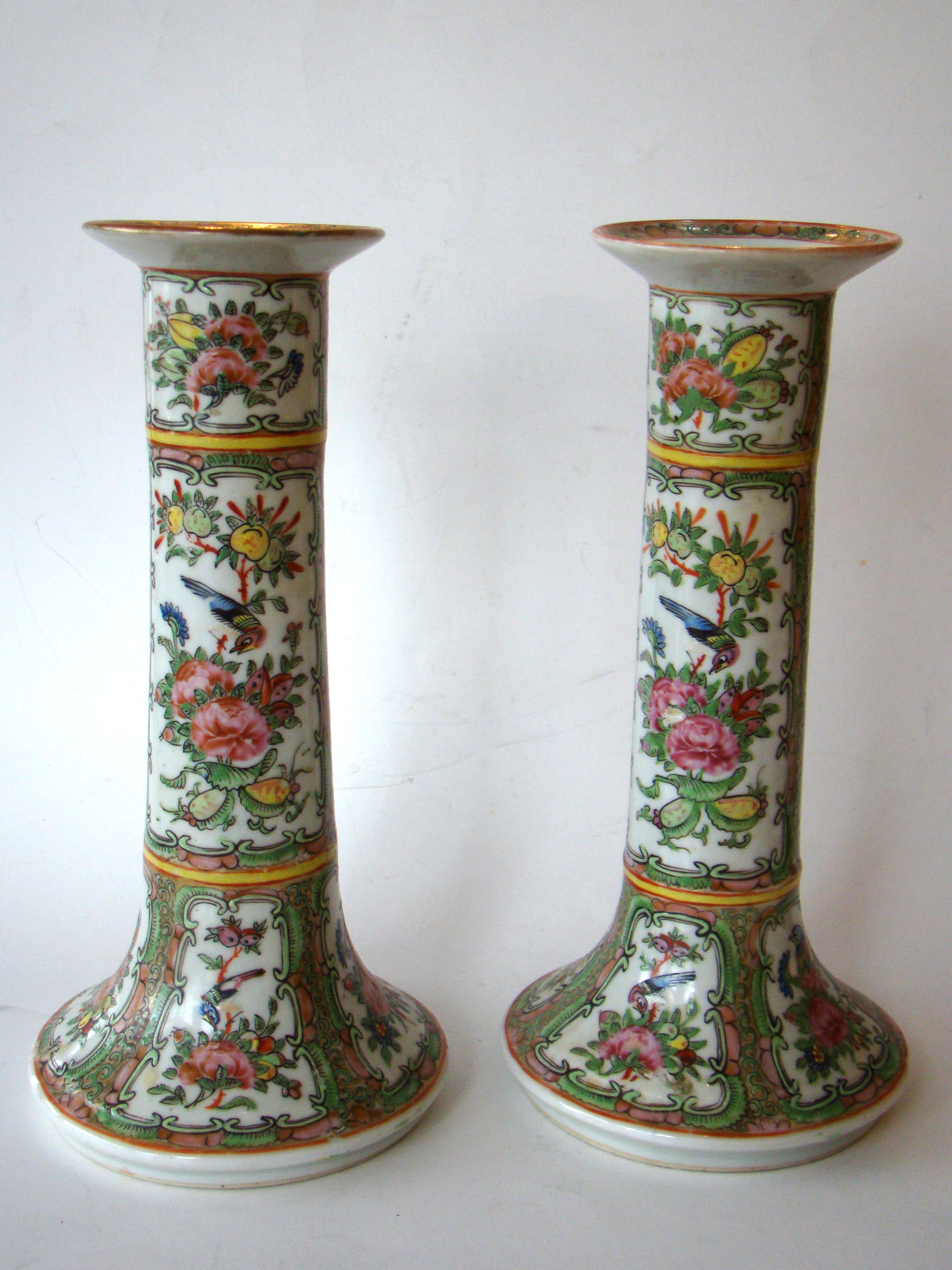 An attractive pair of tall antique Chinese export 'Rose Medallion' candlesticks circa 1840