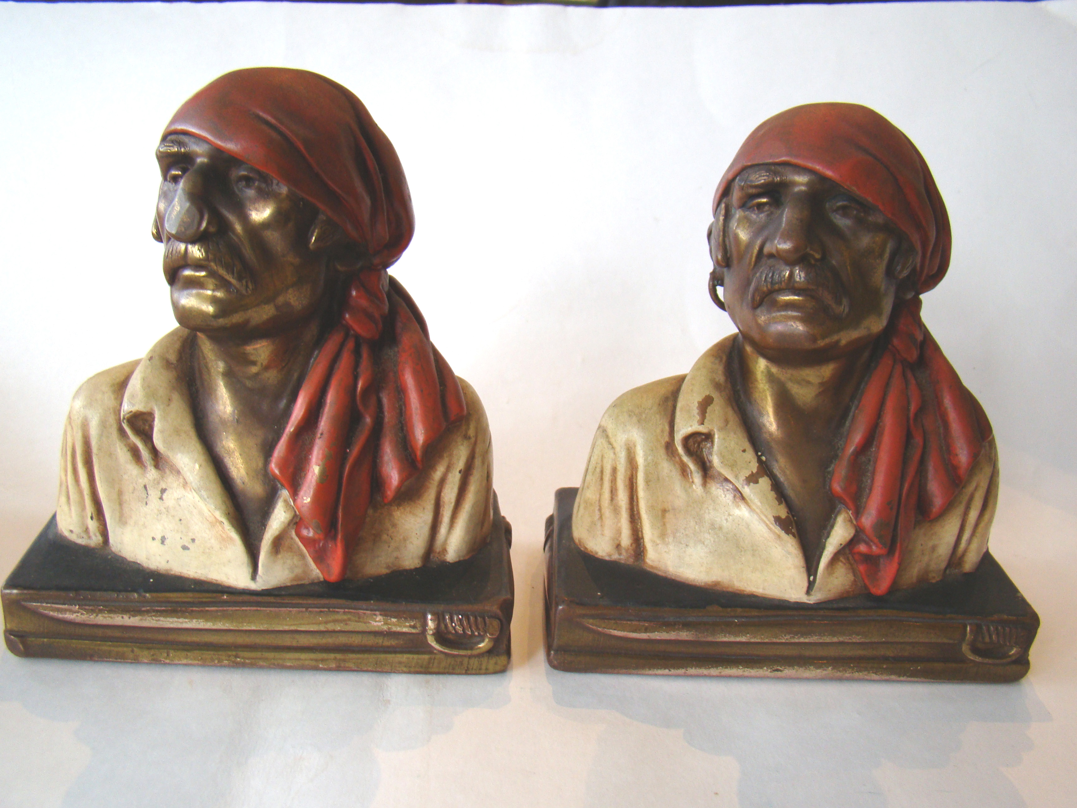 A pair vintage Pirate bookends designed by Paul Herzel and made by the Pompeian Bronze Company circa 1930