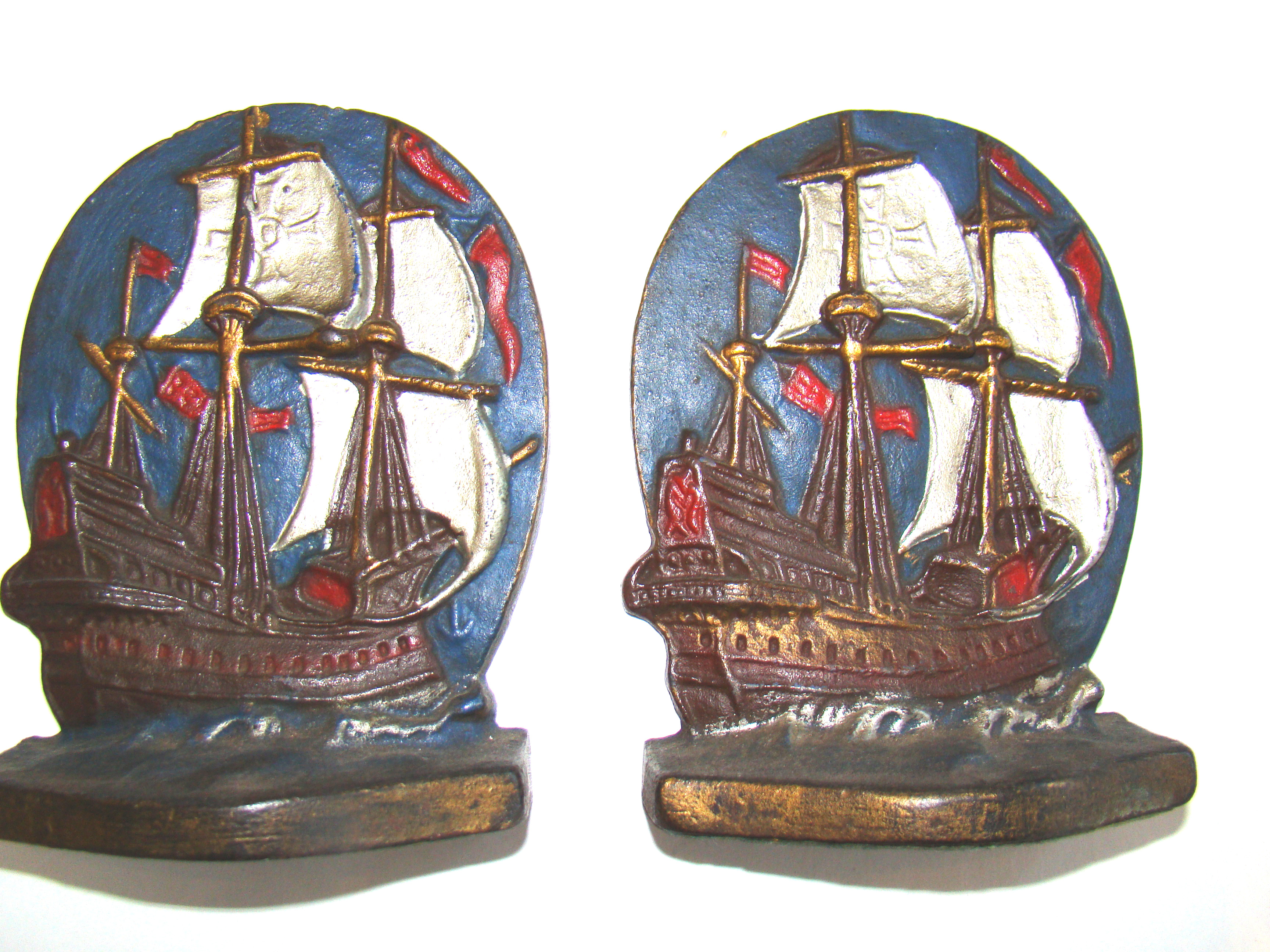 A pair of vintage cast iron "GALLEON" bookends circa 1920