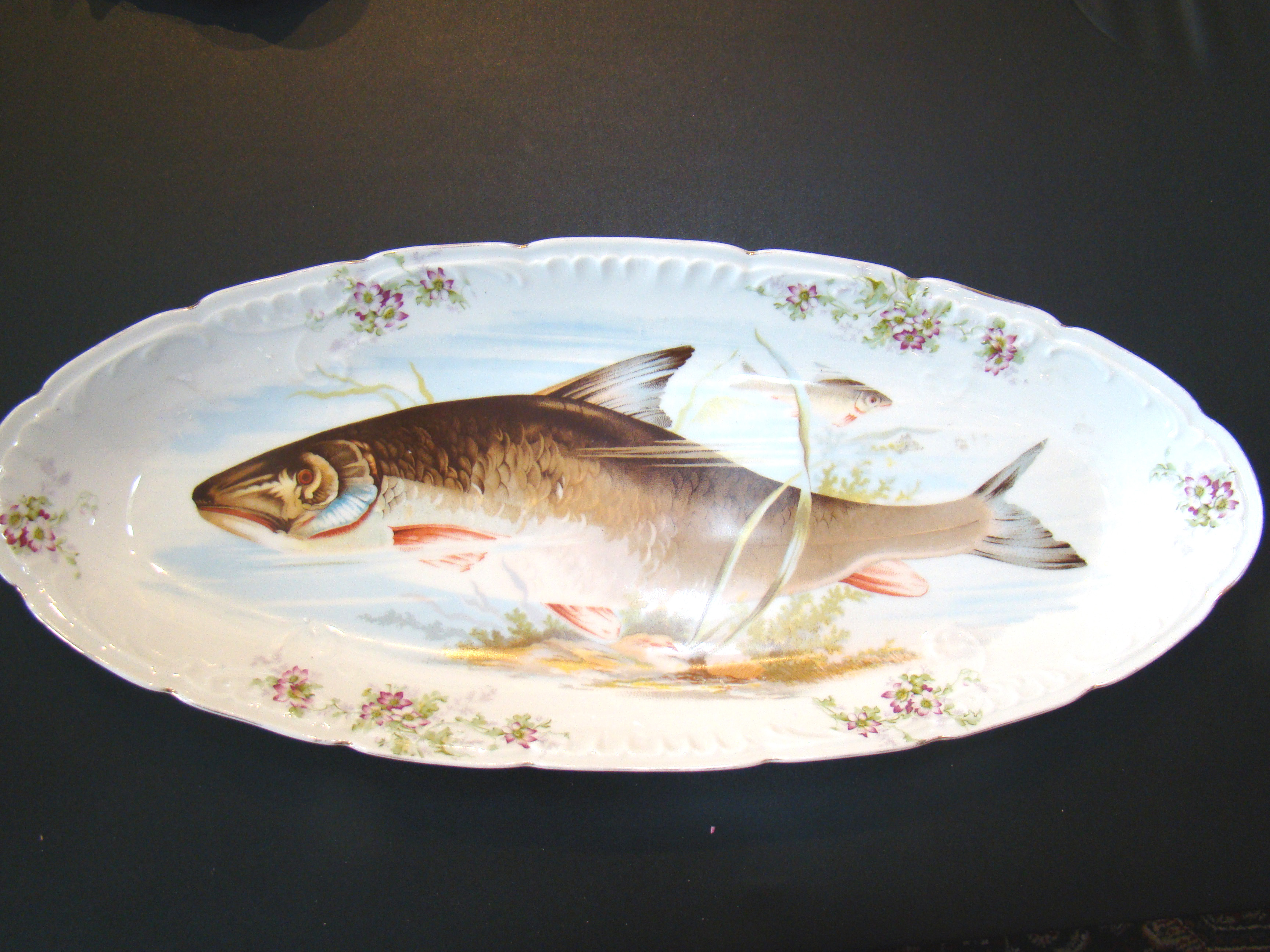 A very attractive hand painted fish service made by Lewis Straus & sons, Carlsbad, Austria, circa 1888