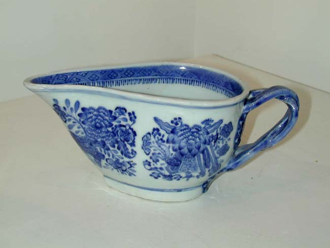 A Chinese Export Blue Fitzhugh Creamer with Strap Handle circa 1810.