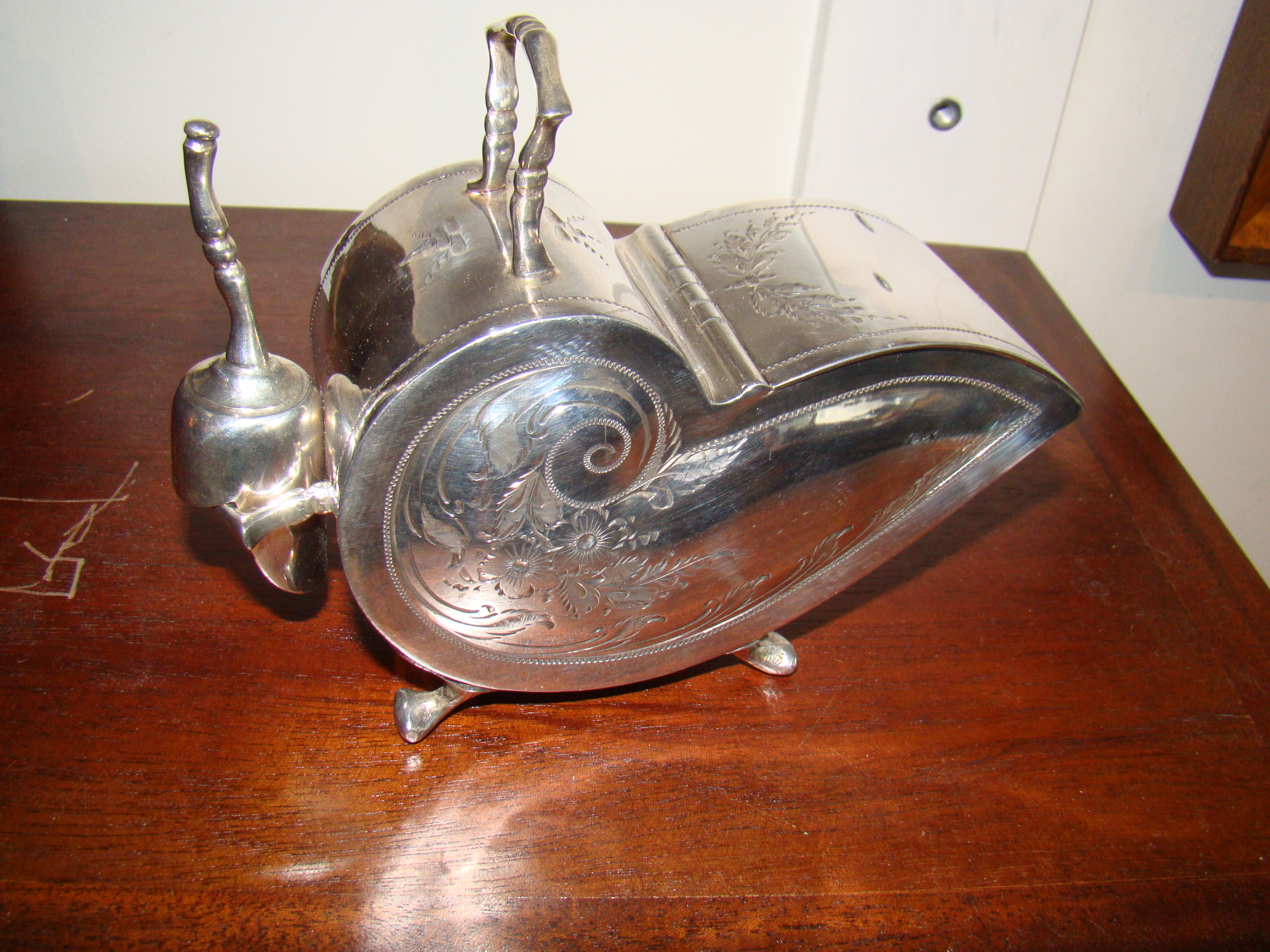 A Victorian silver-plated sugar scuttle circa 1850
