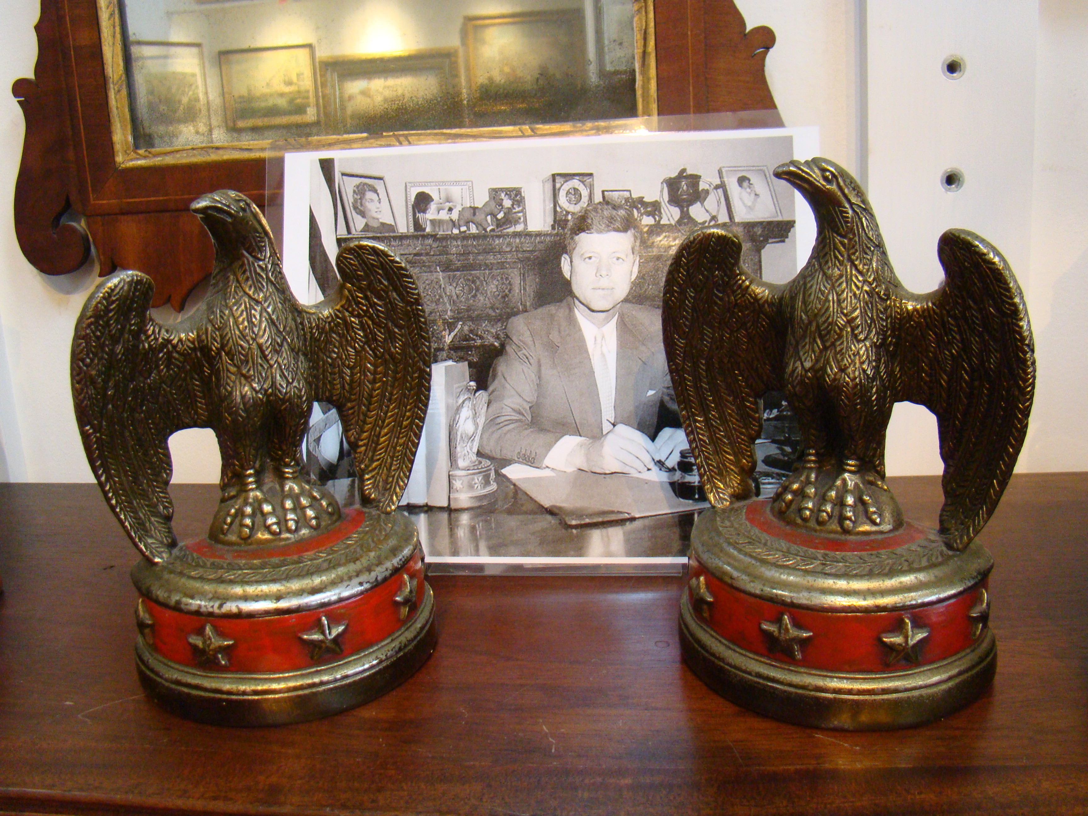 A rare pair of John F. Kennedy eagle bookends in red circa 1960