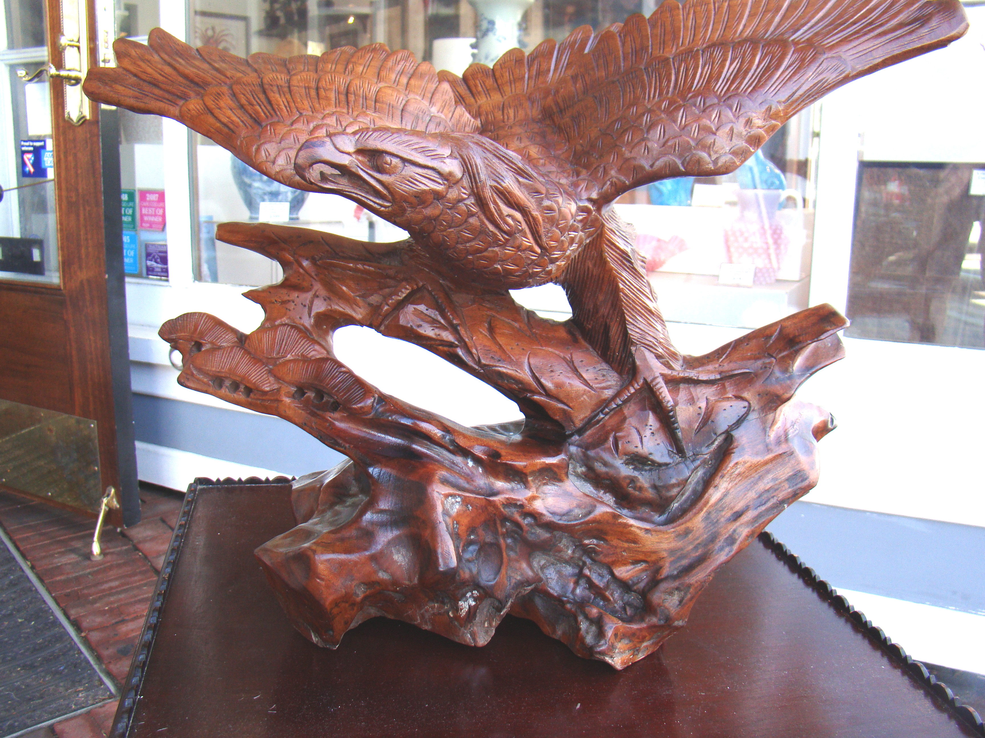 A wonderful carved eagle carved from one solid piece of wood