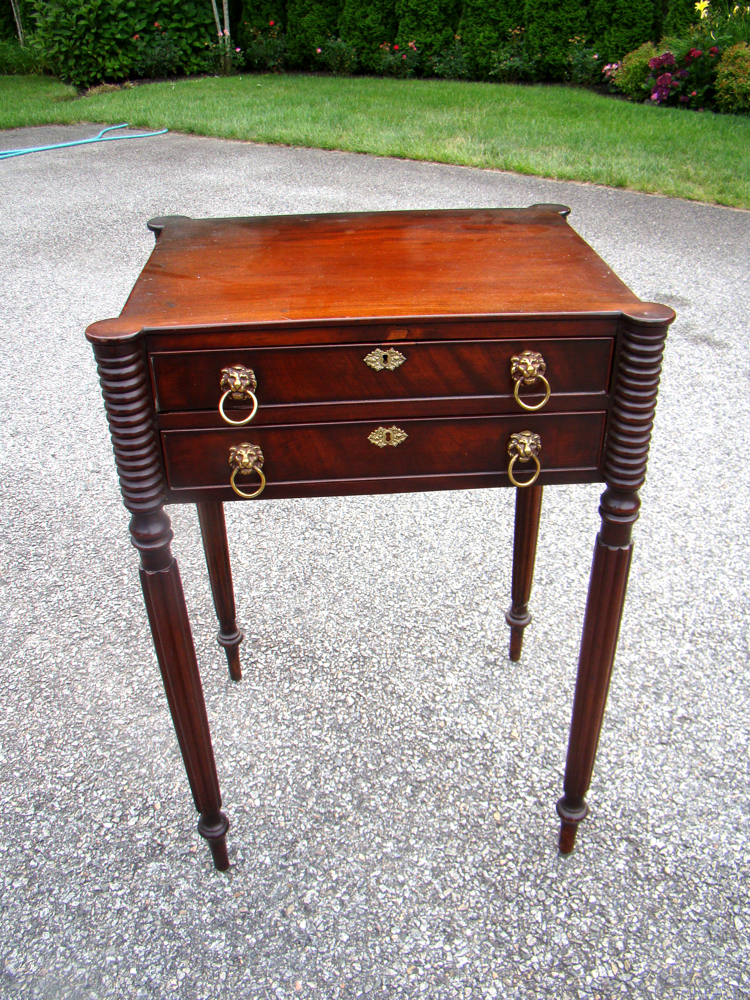 A fine Sheraton two-drawer mahogany stand made circa 1805 from the North Shore of Massachusetts