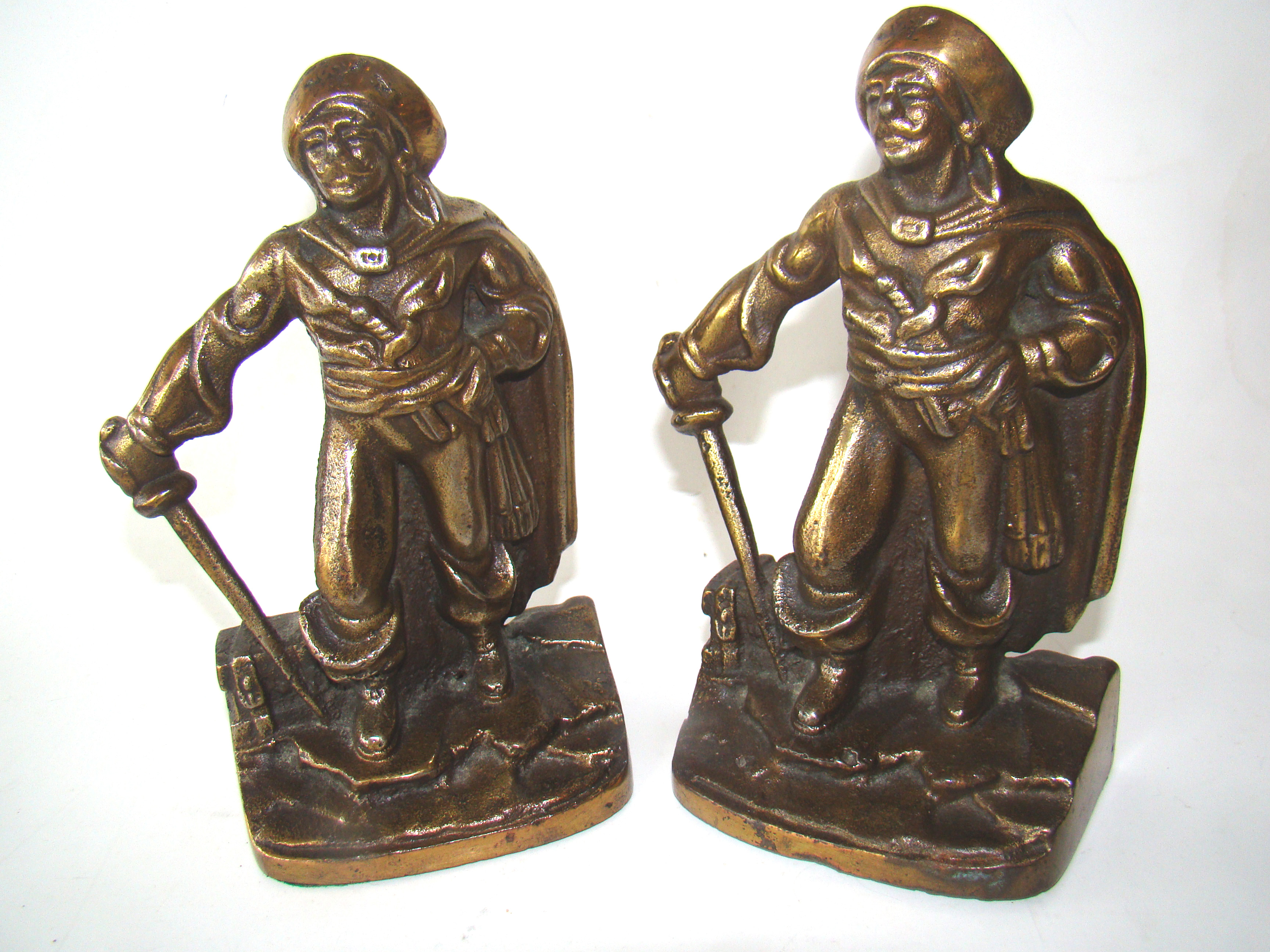 A pair of vintage brass/bronze pirate bookends circa 1930