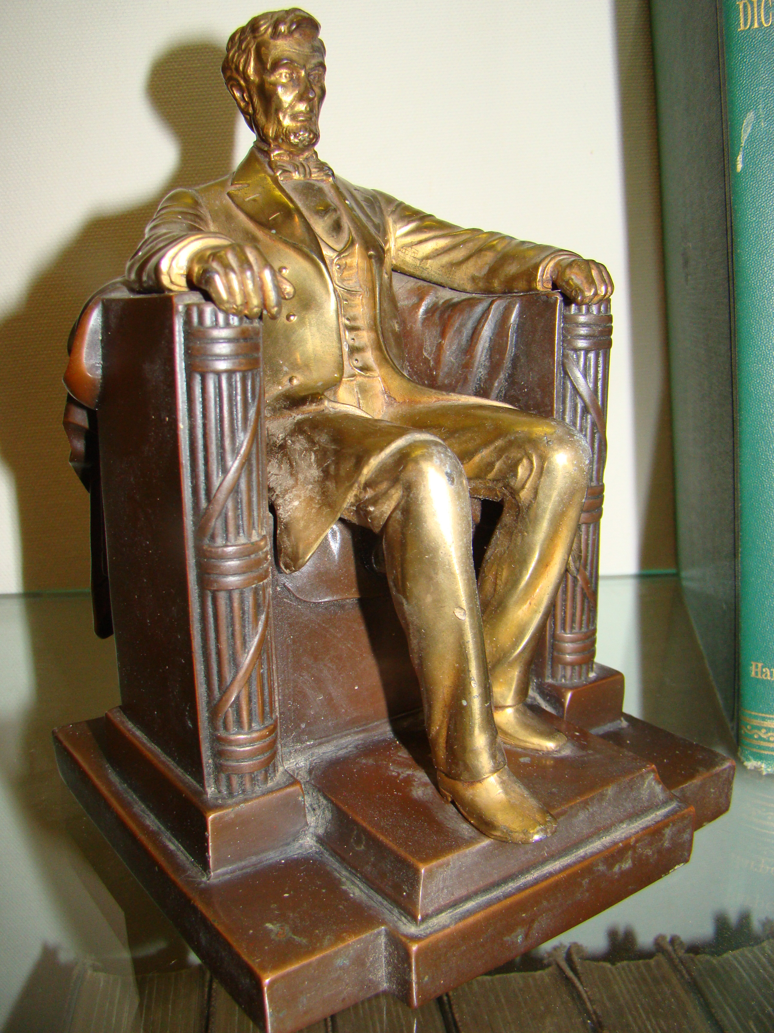 A fine vintage Abraham Lincoln 'sitting in the chair" bookend circa 1930
