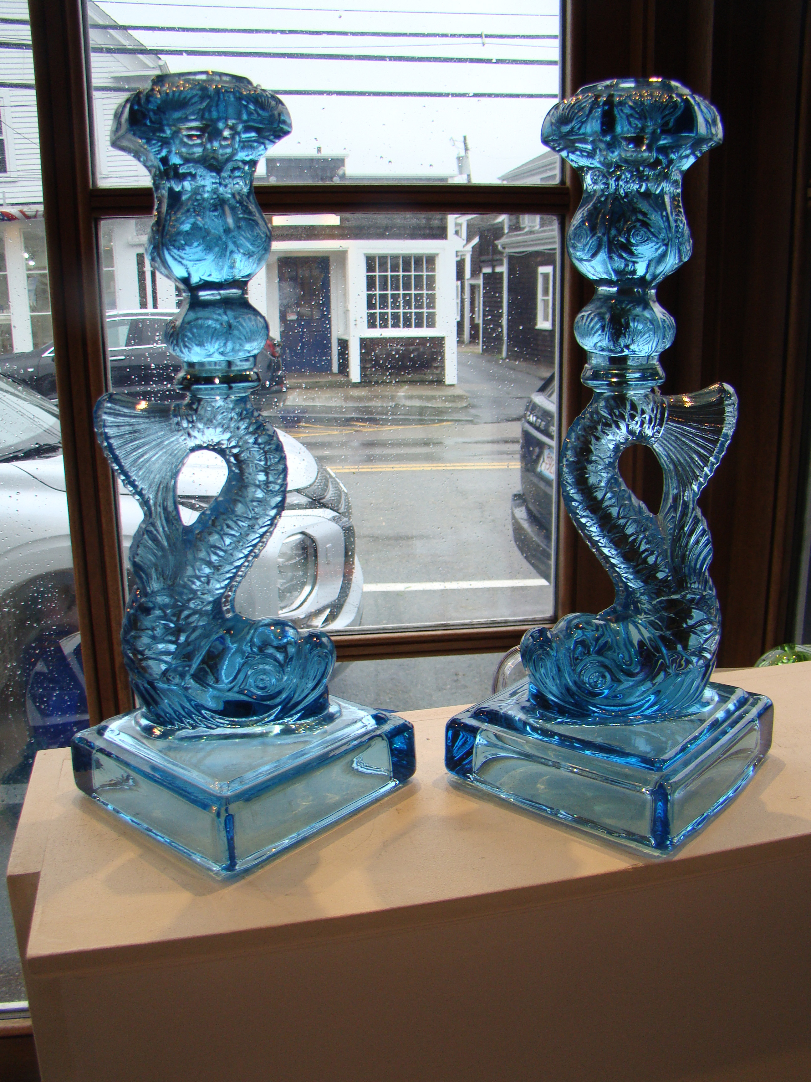 A fabulous pair of aqua blue dolphin/coy candlesticks from the Metropolitan Museum of Art