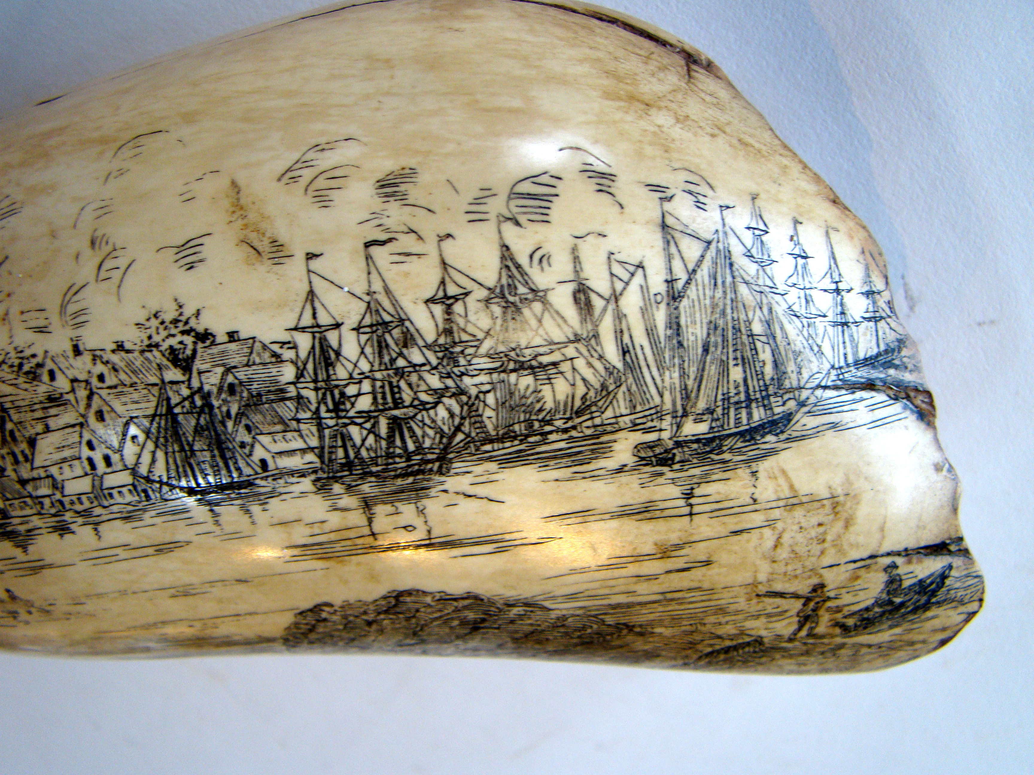 A FABULOUS, probably faux, scrimshaw whales tooth, depicting "A View of Nantucket, 1853" — image 4