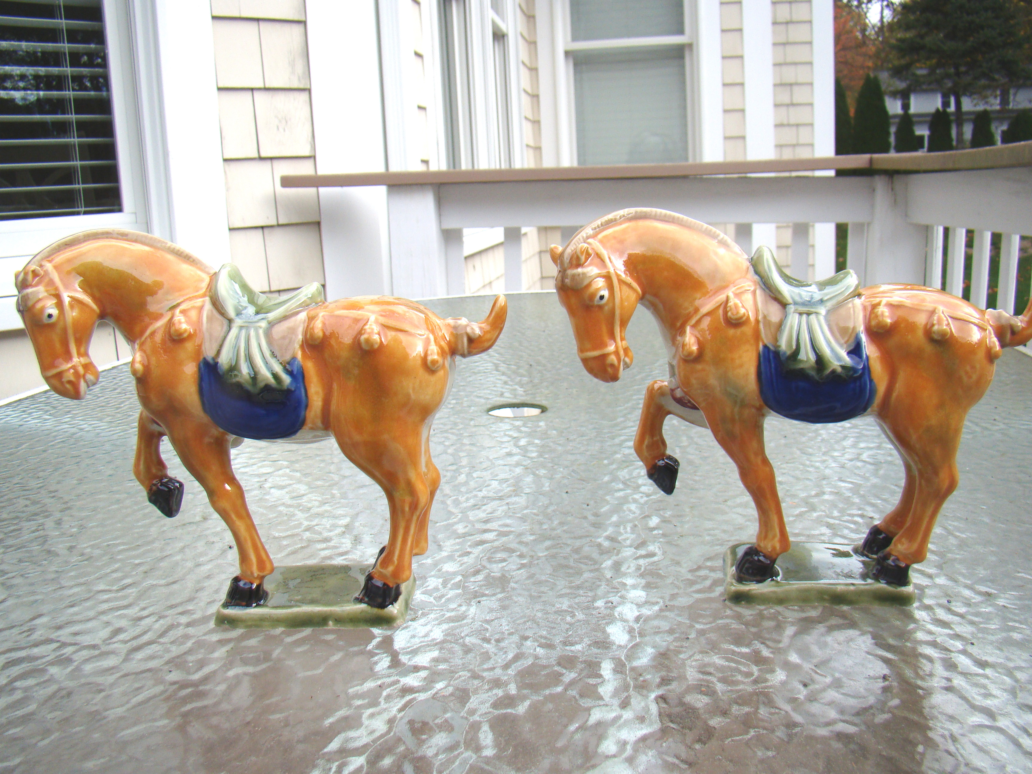 A fine pair of vintage Chinese TANG porcelain horses with saddles